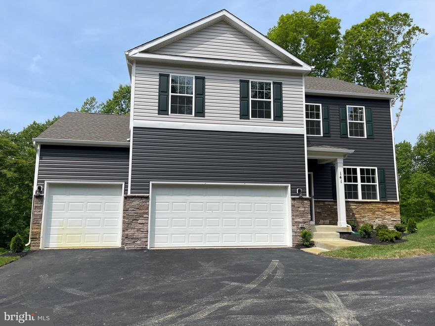 Delivering in June. Some photos are of a furnished model. The Galen is a 4 bedroom, 2.5-bathroom plan offering a 3-car garage and 2,765 of finished square feet on a wooded home site. It features a spacious kitchen with breakfast island, generous cabinet space and a walk-in pantry. The kitchen opens to the oversized living room with plenty of space for entertaining. A flex room is also on the main level, perfect for a formal dining room or home office. The expansive owner’s suite on the second level features a vaulted ceiling, as well as a spa-inspired bathroom with a tiled shower, and double vanities. Three additional bedrooms, a full bathroom and a walk-in laundry room are also on the second level. On the lower level of the home is a spacious finished recreation room, perfect for family movie nights! Quality materials and workmanship throughout, with superior attention to detail, plus a one-year builders’ warranty. Your new home also includes our smart home technology package! *Photos for viewing purposes only, some are not of actual home*