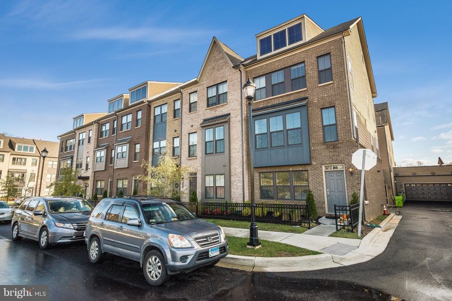 Beautiful newly constructed END UNIT TOWNHOUSE in prime location!  Minutes from TWO Metro stops! Shuttle conveniently takes you from the neighborhood to the Metro. Just steps from Wholefoods, a gym, shopping, and plenty of restaurants. Top updates throughout. Chefs quality kitchen with massive center island that is  entertaining. 2 car attached garage, deck on second level, additional roof top patio, and playground in the neighborhood give you plenty of space side! Tons of natural light on every level. Rec room on lower and top level are   play room, office, or additional bedroom.