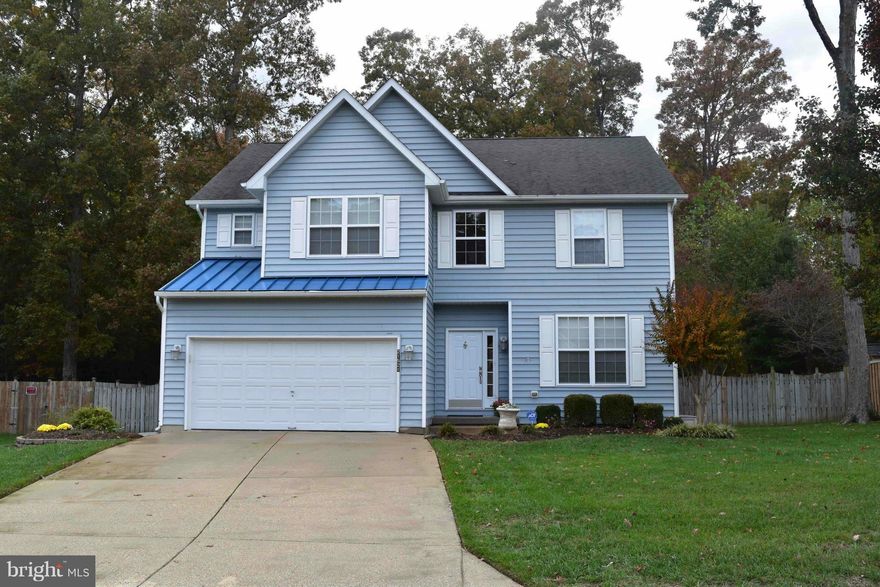 Soaring Ceilings, Beach Access and just minutes from NAS PAX River! 4 bedrooms 2.5 baths. Big and Bright, Beautiful floors, 9'' ceilings through out an spacious completely updated kitchen with a pantry, under cabinet lights, space for a table and opens to an enormous family room with 2 story ceilings, master suite with walk in closets, dual sinks, separate shower. Fenced yard shows pristine care