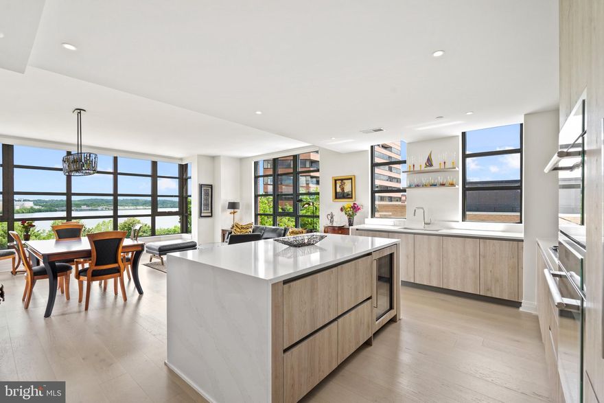 Potomac River views with brilliant Southern and Eastern sun light in this rare, corner residence at the luxurious Muse Condominium.  3 bedroom/2.5 bathroom with over 1,800 square feet provides plenty of space for work, recreation and visitors.   Watch the sunrise glisten over the Potomac while enjoying  morning coffee.  Entertain or relax on the private balcony located off the open plan living and dining room .  Kitchen includes Snaidero cabinets, quartz countertops, Thermador appliances, wine cooler, kitchen window over the sink area, and large island.  Other features include 10' + ceilings, upgraded custom closets, upgraded light fixtures, ceiling fans, 65 inch SONY TV, Sound Bar and Subwoofer, Custom made Walnut Case,  cabinet upgrades, recessed lighting, 6" plank hardwood floors, large laundry room with full-sized washer and dryer, window shades, plenty of closets, walk-in closets, with extra storage, storage space (S15), and two parking spaces (G1-09 and G1-19), one with electric car charger.  World-class amenities include 24-hour concierge, fabulous fitness center, meeting/lounge room, roof-top deck, rooftop clubroom  and more. Enjoy strolls along the river, Farmer's Market Saturdays, local restaurants and shopping, neighborhood parks and more. 1 mile to Braddock Road Metro, 2.7 miles to Reagan National Airport, 3.1 miles to Amazon’s HQ2, 4.6 miles to National Harbor, and 6.5 miles to Washington DC.