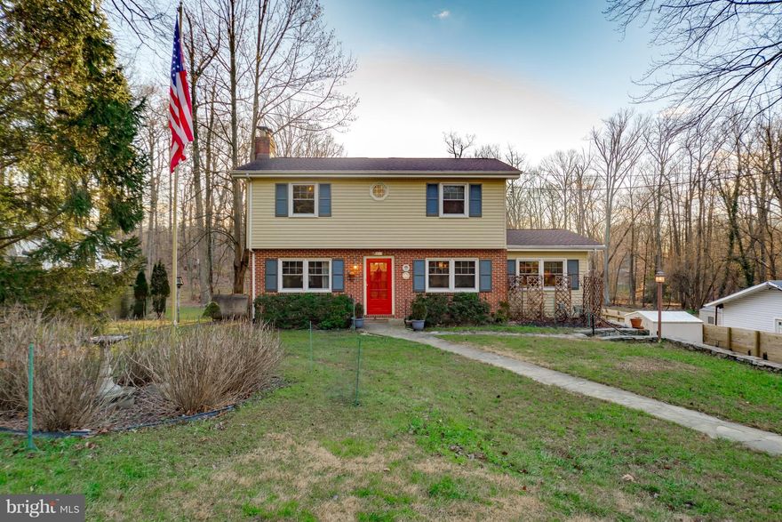 Hidden behind a humble facade is a spectacular 3,500 sq ft home.  featuring four bedrooms two-and-a-half baths, open concept kitchen/ great room, walk in pantry, multi directional flow throughout the first floor,  hardwood floors, fireplace in living room, spa-like ensuite, laundry on second floor, finished basement with wood stove, one and two car garages, on a level acre and a pond.