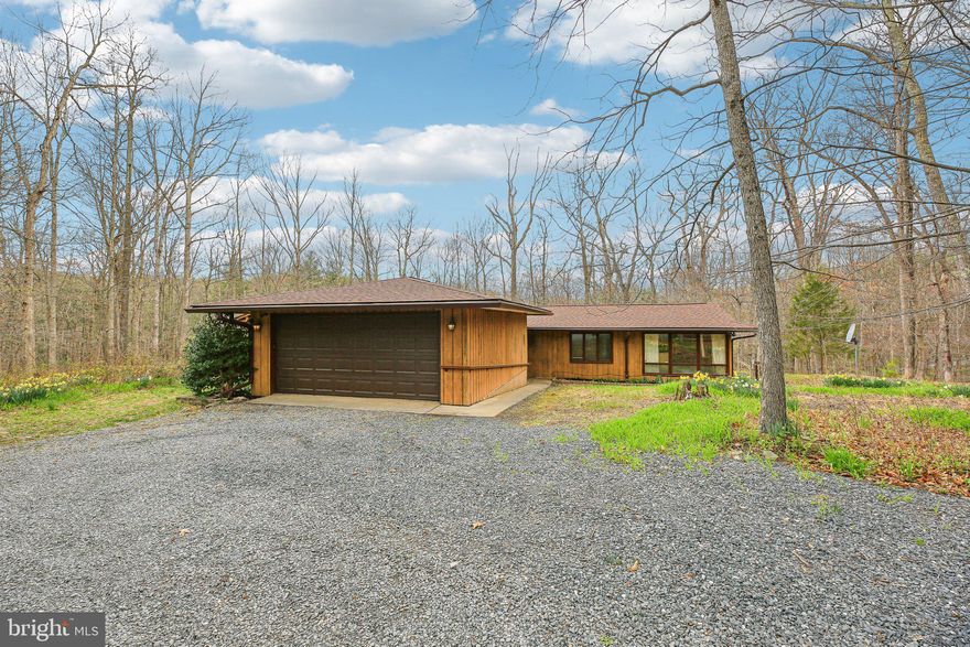 Welcome to this spacious 4-bedroom, 2 full bath, and 1 half bath contemporary home set on 5 picturesque acres. This home offers endless potential for the right buyer, with a layout that includes a large living area, ample bedrooms, and generous outdoor space perfect for privacy or recreation. The property also features a detached garage/barn with providing additional storage or workspace.

The master bathroom has been gutted and is ready for your personal touch, allowing you to create the perfect retreat. While the home is in need of some improvements, this presents an excellent opportunity for those looking to invest in a property that can be transformed into their dream home.

Please note that this home is not eligible for traditional financing and will require alternative financing options. With a little vision and effort, this property has the potential to be a truly unique and customized living space. Don’t miss your chance to make this property your own!