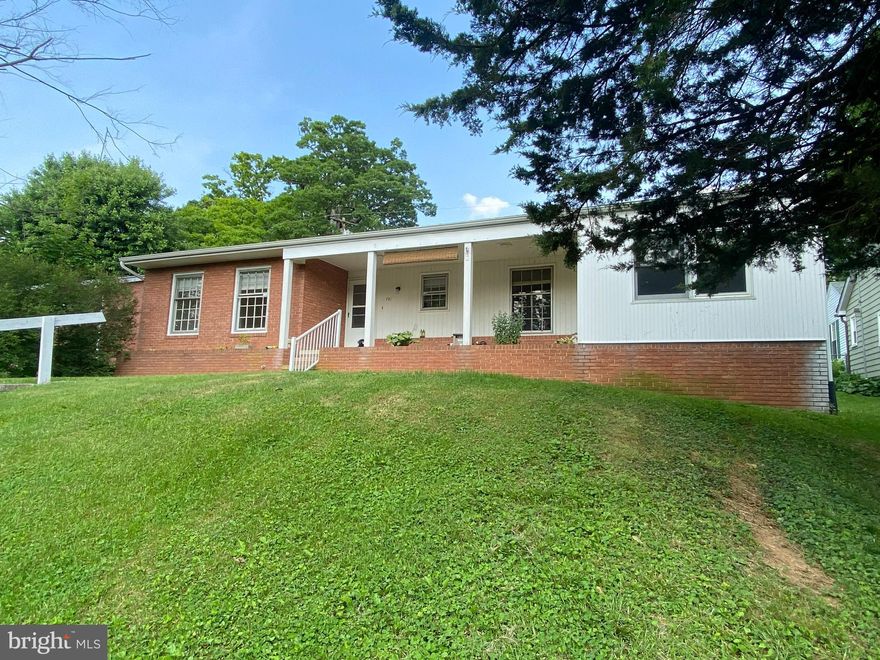 Location is prime on this home! Hardwood floors have been refinished, new flooring in bathroom and kitchen. This home boast almost 1700 square foot all on one level. 3 bedrooms, 2 full bathrooms, large family room, kitchen, large eat in area, and a large den\rec room. Home has a new HVAC just over 1 year old. The bedrooms are large with cedar closets.  Sit on the large front porch and look out at the park.  Back alley has parking for a couple cars as well as front parking.