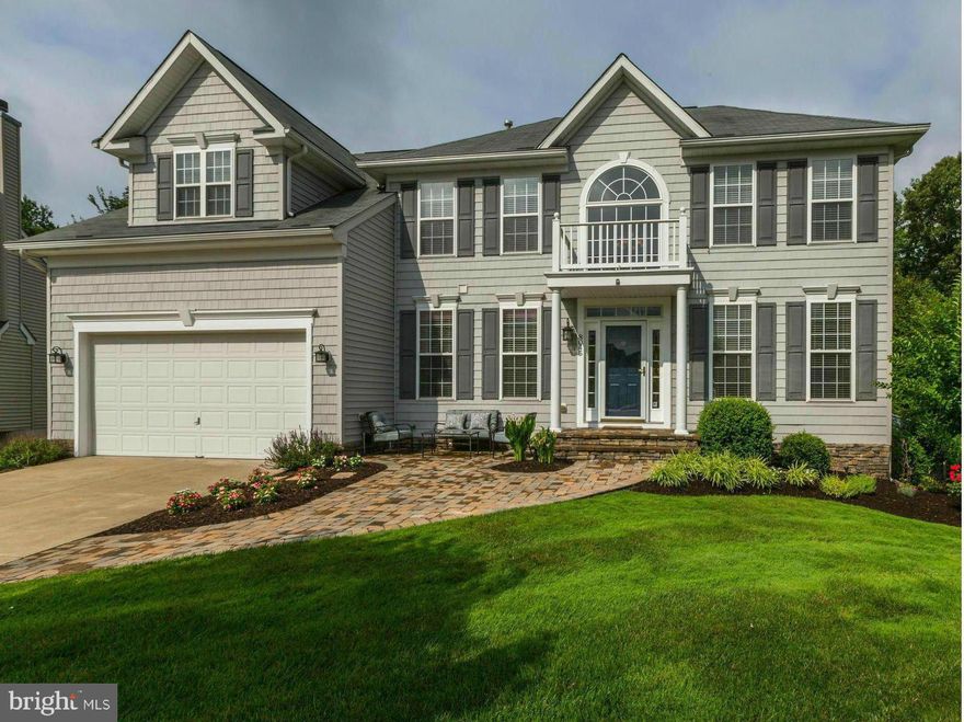 Impeccable Custom Luxury Renovation w/Over $140k in Upgrades! Top-of-the-Line Gourmet Kitchen w/Quartz Counters, Huge Center Island, 48" Professional Wolf Range & Sub-Zero Fridge! Luxurious Master Suite w/Large Walk-Ins, Sitting Area & Huge Master Bath. Finished Walk Out Bsmnt w/Theater Room & Kitchenette. Spectacular 2-Tiered Azek Deck Overlooks Large Yard Backing to Trees. Must See Virtual Tour!