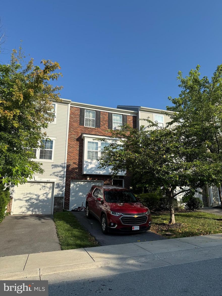 The beautiful townhome with 3 bedrooms, 2 full baths, and 2 half baths. The master bedroom features an bathroom with double sinks, a shower stall, and a soaking tub. The home includes a large outdoor deck.