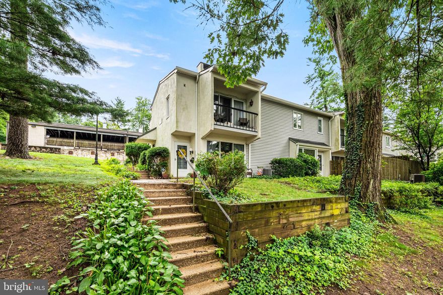 Location, charm, and lifestyle await at this beautifully updated end-unit townhome in sought-after Greene Countrie Village, Newtown Square. This multi-level, 1-bedroom, 1-bath townhome offers a perfect blend of comfort, privacy, and convenience—ideal for first-time buyers, down sizers, investors, or anyone seeking a low-maintenance lifestyle in a park-like community setting. Step inside to find a smart layout that maximizes space and light. The entry level features a coat closet and flows into the bright and spacious living room, complete with stone fireplace, crown molding, and triple sliding glass doors that bring in beautiful natural light and open to the outdoors. Just two steps up, the elevated dining area with recessed lighting overlooks the living room and sits adjacent to a tastefully updated kitchen featuring stainless steel appliances, new white cabinetry, granite countertops, electric stove, and built-in dishwasher—all ready for your culinary adventures. Retreat just a few steps up to your private primary suite, complete with three large closets, a ceiling fan, and triple sliders that lead to your own enclosed garden oasis—featuring a composite deck, perfect for morning coffee or peaceful evening unwinding. The hall laundry closet is conveniently located near the updated full bath, which boasts bright, modern finishes. Located at the end of the row, this home offers enhanced privacy and additional natural light. The Greene Countrie community provides wonderful amenities including a clubhouse, a sparkling outdoor pool, and maintenance-free living.
Enjoy easy access to nearby parks like Sawmill, Skunk Hollow, and The Willows, as well as close proximity to Newtown Square, Wayne, and Media for shopping, dining, and entertainment. With quick access to major highways, public transit, and Philadelphia International Airport, commuting is a breeze.
Don’t miss this rare opportunity—schedule your showing today and discover your new favorite place to call home!