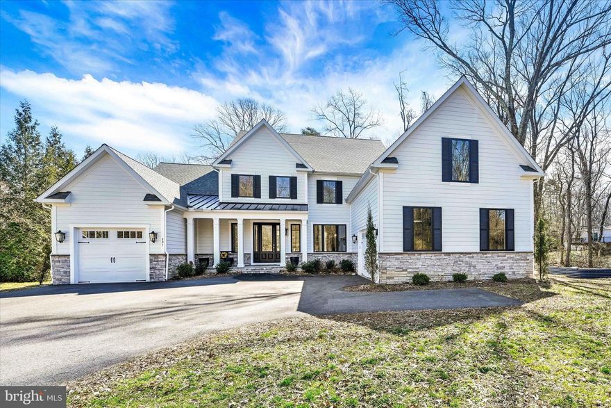 Homestead Retreat - Welcome home!
This stunning, recently built home (2023) offers the perfect blend of luxury, comfort, and convenience. Nestled in an exclusive enclave of homes, it provides the ideal balance of privacy while being just a short drive away from Annapolis and major routes like Rt 97, 50, and 32. Spanning three finished levels, this home boasts an impressive 5 bedrooms, 4 full baths, and 2 half baths. With high ceilings on the main level and a fully finished lower level, it is designed to impress. The property includes a 2-car garage, a separate 1-car garage, and a spacious, open floor plan that is move-in ready.
Key Features:
Main-Level Primary Suite: The elegant primary bedroom features two walk-in closets with custom built-ins and a luxurious en-suite bath. Gourmet Kitchen & Great Room: The open-concept kitchen seamlessly flows into the great room, which features a two-story coffered ceiling, a gas fireplace with stone and shiplap accents, and large windows. The kitchen is equipped with top-of-the-line appliances, including a counter-depth refrigerator and freezer, a wall oven, built-in microwave, propane range, and dishwasher. A generous covered screened porch off the kitchen is perfect for outdoor living.

Formal & Casual Spaces: The two-story foyer welcomes you with a grand staircase, leading to a formal dining room with chair rail molding. A large office, spacious laundry room with cabinetry and a sink, mudroom with coat closet and drop zone, and access to the 2-car garage complete the main level.

Upper Level: Upstairs, you'll find four spacious bedrooms, two full bathrooms, and a beautifully designed staircase leading to the finished lower level.

Lower Level: The fully finished lower level offers a recreation room, media area, seating area, full bath, and plenty of additional storage space.

Upgrades & Details: This home features Hardie-plank siding, 400 amp electrical service, and zoned heat pumps (with propane backup on the first floor). The home is equipped with concealed sprinkler heads, gutter guards, and exceptional craftsmanship throughout, including cove crown molding, chair rail, and board-and-batten trim.

Additional Information: The location offers both a peaceful retreat and convenient access to all the amenities of Annapolis and major highways. This home is a rare find, with incredible attention to detail and high-end finishes throughout. Don’t miss your chance to tour this beautiful property today!