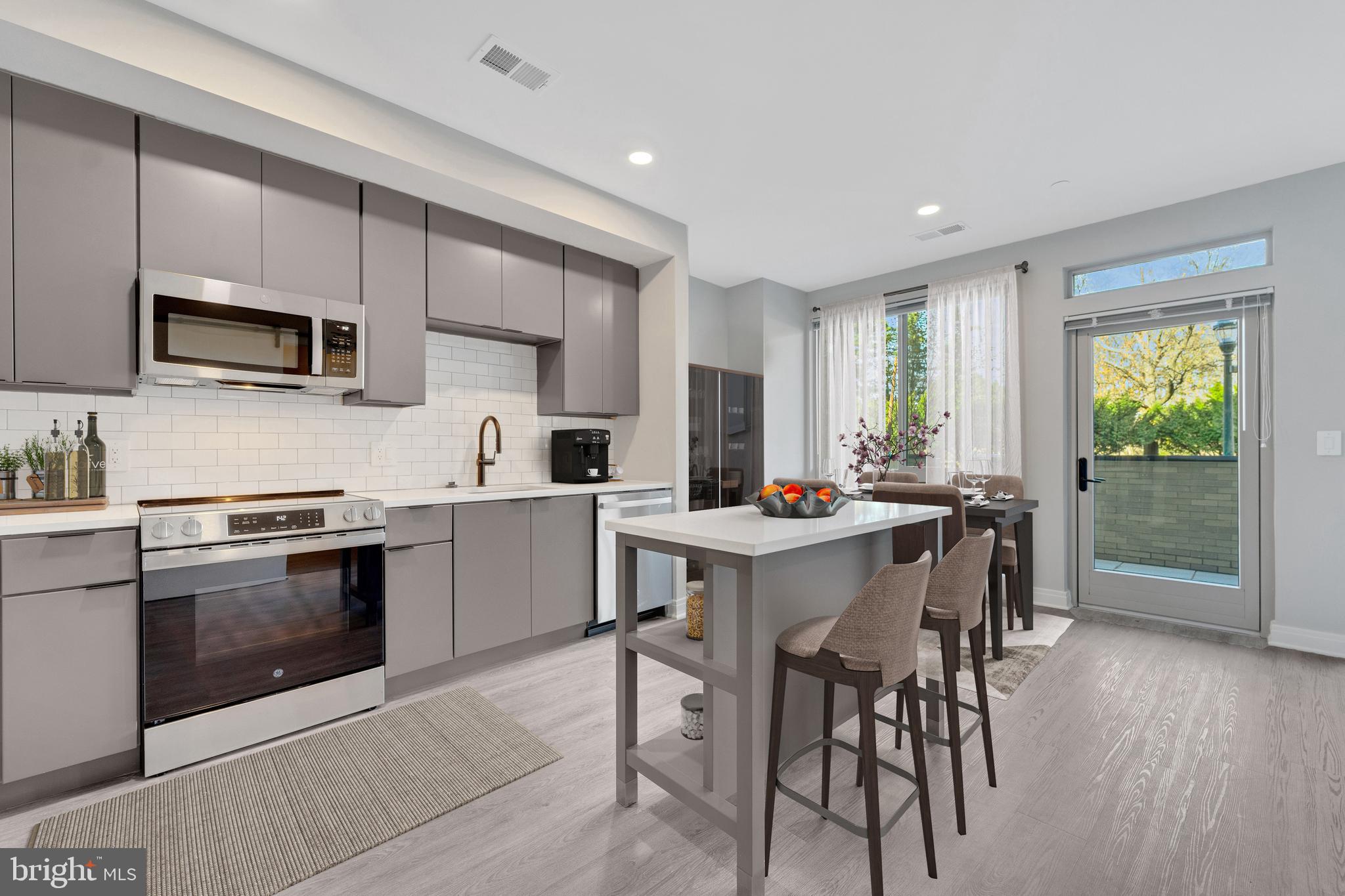 Welcome to Atwell on Spring, a vibrant new community in the heart of Silver Spring. Offering beautifully designed new construction townhomes for lease -- units 002, 003, 004, 005, 006, 007, 008 and 009 are now available!
These stunning townhomes feature spacious open-concept layouts, gourmet kitchens with sleek quartz countertops, stainless steel appliances, and custom cabinetry. Enjoy designer finishes throughout, including luxury vinyl plank flooring, expansive windows for natural light, and spa-inspired bathrooms with contemporary fixtures. Each home also offers ample storage, walk-in closets, and private outdoor spaces perfect for relaxing or entertaining.
As a resident, you'll enjoy access to an array of resort-style amenities, including a sparkling outdoor pool with a sun deck, a state-of-the-art fitness center, and stylish resident lounges ideal for socializing or unwinding. The community also offers co-working spaces, a conference room, and multiple lounges with grills and open-air dining — perfect for hosting gatherings. Additional conveniences include secure bike storage, garage parking, and a pet spa to keep your furry friends pampered.
Located just steps from downtown Silver Spring, you’ll have easy access to dining, shopping, and entertainment. Plus, the Silver Spring Metro Station is just minutes away, offering seamless commutes to D.C. and beyond.
Don’t miss the opportunity to lease a brand-new townhome in one of Silver Spring’s most exciting new communities. Contact us today to schedule your tour!