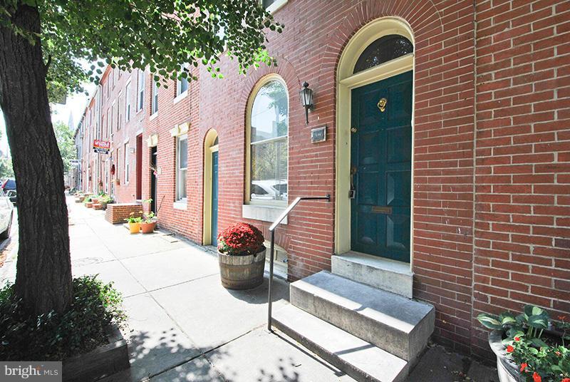 GRACIOUS 2761 SF FEDERAL HILL HOME IN DESIRABLE LOCATION WITH PARKING. TWO TIER DECK PROVIDES STUNNING VIEWS OF CITY AND WATER. ORIGINAL HARDWOOD FLOORS, WOODBURNING FIREPLACE, EXPOSED BRICK WALLS AND OTHER ARCHITECTURAL DETAILS STILL EXIST IN THIS BEAUTIFUL HOME. THIRD LEVEL FEATURES FABULOUS BEDROOM SUITE. PROPERTY IS WITHIN WALKING DISTANCE TO HARBOR, RESTAURANTS AND SHOPS.
