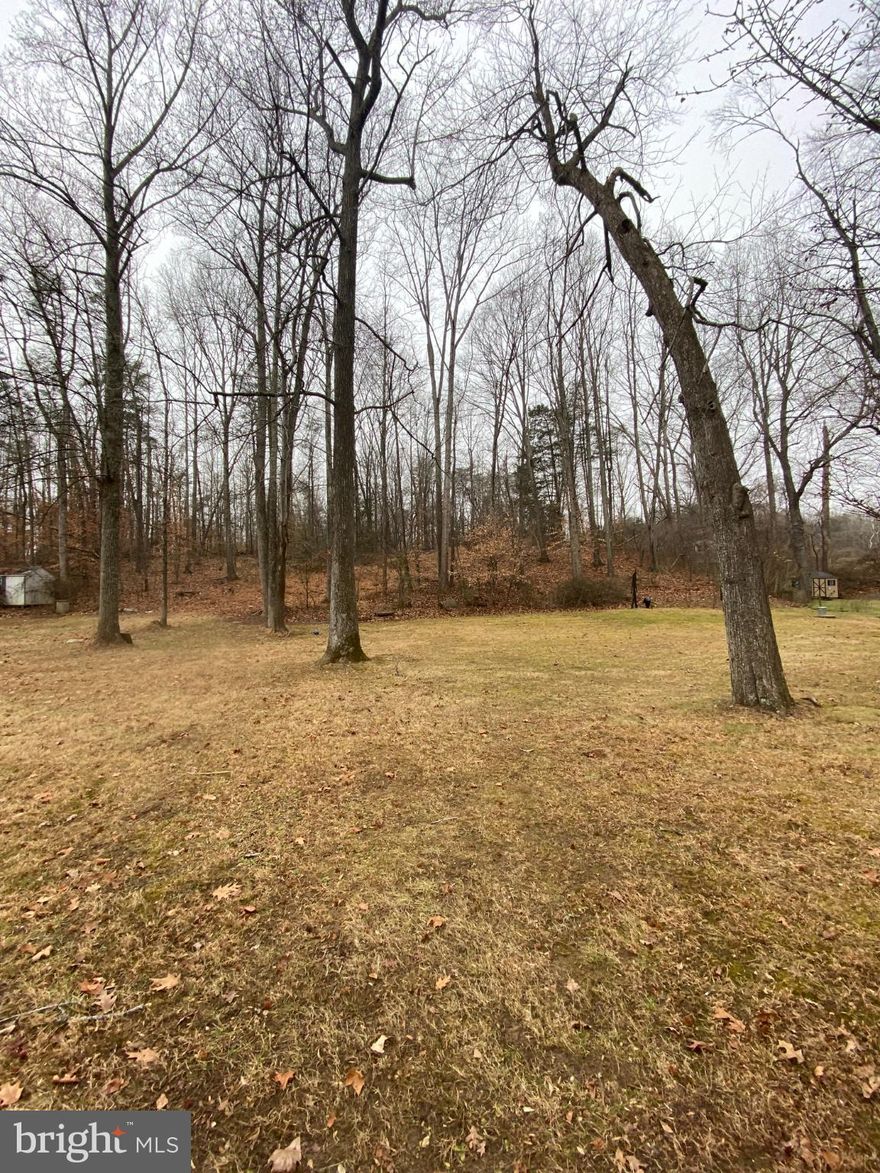 Opportunity awaits with this well-located .33ac property. Build your own single family home on this land or hold it as an investment for your future.  Tall mature tress and amply yard space for your enjoyment . Situated in a desirable area with quick and convenient access to major routes, shopping, and local amenities.  No HOA to interfere with your dreams and no HOA expense. 
The seller represents that public water and public sewer are available to tap into, adding significant value and reducing development uncertainty.  Documentation of water and sewer access available on request. These documents provided by Stafford County Government to the seller. Buyers are encouraged to perform their own due diligence to confirm utility availability, tap fees, zoning, and intended use. A rare chance to secure a property with existing public utility access in a growing area.