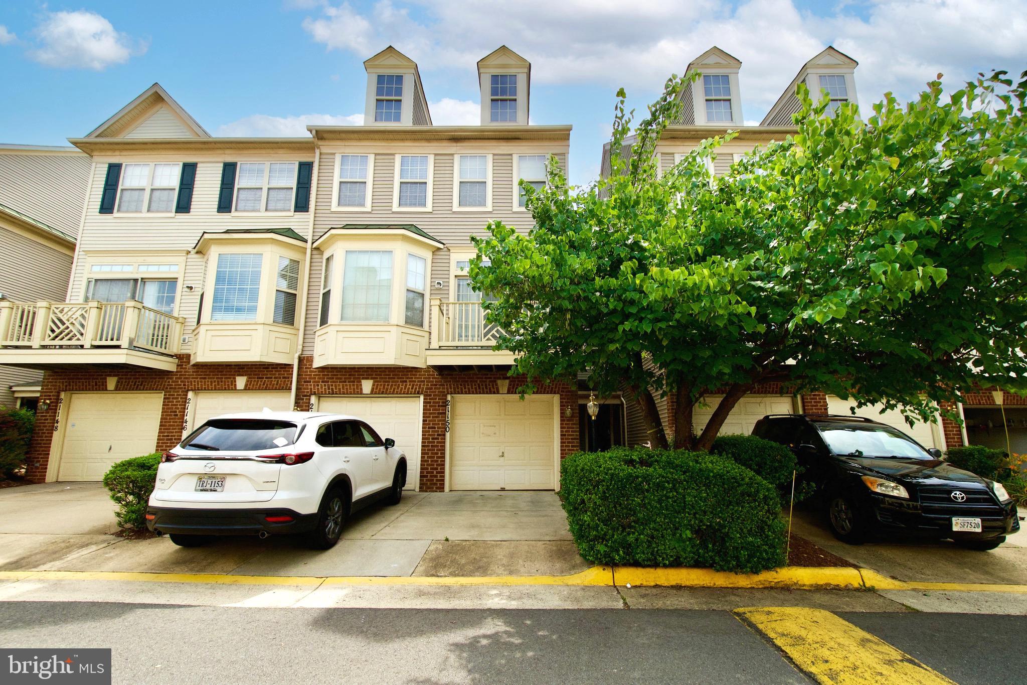 This is a gem! You have to see it! This gorgeous 3 level condo townhouse with garage and balcony has bay window on second level bringing in lots of light. Fresh paint recently june 2025 throughout. The living room fireplace adds ambiance. The HVAC system and washer/dryer has been replaced on 2022. Beautiful laminate floors on all 3 levels replaced on 2022. water heater and balcony replaced on 2023. The spacious master bedroom has a vaulted ceiling. Enjoy all the amenities of Cascades and Lowes Island, 5 swimming pools, club houses, tennis courts, jogging /walking /bike trails, tot lots, basket ball courts, 2 exercise facilities. Walk to shopping, restaurants, library, Sunday's farmer's market. NOVA community college is right behind the development. Great area to live in as it is close to all major stores including Costco and Dulles Mall, also Algonkian Park and public golf course.