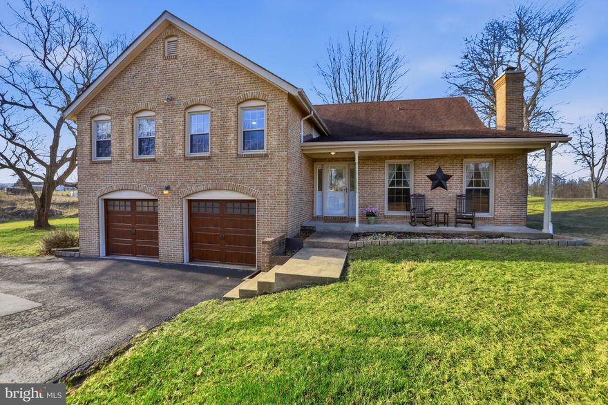 Welcome to 4708 Summit Point Road. Set on 4.65 acres of unrestricted land, this brick Cape Cod split-foyer home offers 4 bedrooms and 2 full baths, with open, usable acreage well suited for horses, gardening, and small animals.

Inside, the home opens to a bright and inviting family room with wood floors and a wood-burning stove that creates a warm focal point for the space. Just above, the dining room overlooks the family room below, with wood flooring continuing through both levels and creating a natural connection between the living areas.

The kitchen, remodeled in 2021, features wide-plank tile flooring, neutral cabinetry, quartz countertops, and stainless steel appliances. A breakfast nook with table space and a bay window overlooks the backyard, creating a comfortable spot for morning coffee or casual meals. Just off the kitchen, a second family room provides additional gathering space, adding flexibility for everyday living and entertaining.

The primary bedroom includes its own private en-suite bath, while three additional bedrooms are served by a full hall bath, offering comfortable accommodations for family members or guests.

Outdoor living is where the property truly begins to unfold. A new Trex deck just off the dining room extends the living space outdoors, creating an inviting place for grilling, relaxing, or taking in the surrounding landscape. Beyond the deck, the 4.65 acres of unrestricted land provide open, usable space well suited for horses, gardening, and small animals. A beautifully maintained garden area with raised beds is ready for seasonal planting, while a storage shed and dedicated woodshed provide practical space for tools and firewood.

The home includes an HVAC system replaced in 2018 and a roof installed in 2016.

4708 Summit Point Road offers the rare opportunity to enjoy comfortable living paired with unrestricted land — a place where home, garden, and open space come together in a setting that invites you to slow down and make the most of the land around you.