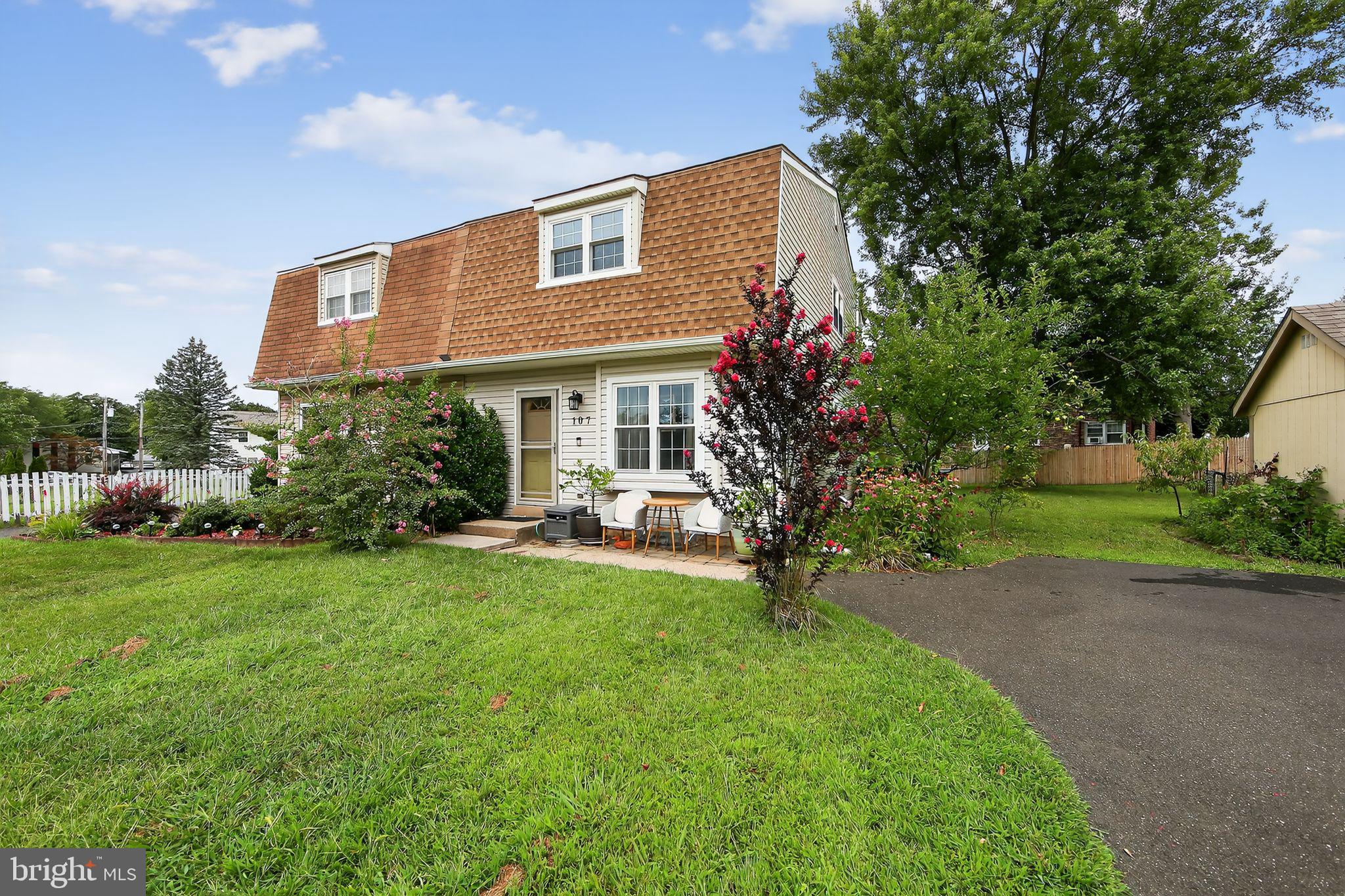 Welcome to this 3-bedroom twin home, ideally located on a peaceful cul-de-sac. Step inside to the living room featuring hardwood floors that seamlessly connect to the formal dining area—perfect for entertaining. The large eat-in kitchen offers ample space for cooking and gathering, complete with island seating for casual meals. A convenient powder room completes the main level. Upstairs, you’ll find three comfortable bedrooms and a full bath. The finished basement expands your living space with a classic oak bar, built-in shelving, a second powder room, and a separate laundry room. Set on a generous 0.22-acre lot, the home boasts a spacious fenced backyard and a deck for outdoor enjoyment. Located close to shopping, dining, and public transportation, this home offers both comfort and convenience. Don’t miss your opportunity to make it yours!