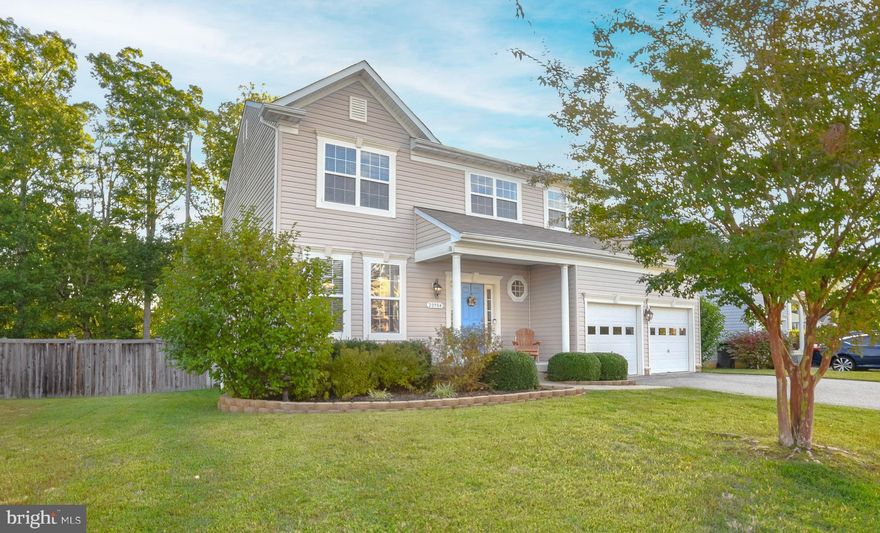 Welcome Home to 20984 Freedom Run Drive.  This home offers approximately 3000 sqft of living space with 4 bedrooms and 3.5 baths and is looking for new owners!  New tankless gas hot water heater in 2021.  New dual zoned HVAC in 2021.  Main level has open floor plan layout with formal dining room/kid play room, half bath, family room and kitchen.  Kitchen has granite countertops and stainless appliances.  Luxury vinyl plank floors throughout the main level.  Four bedrooms on the upper level with primary en-suite bath complete with soaking tub and separate shower and hall bath.  Lower level has great entertaining space boasting a  theater room with bar seating, full bath and additional room which could be an office, work out room or be used as a bedroom.  Surround sound speakers, screen and projector all convey.  There is a deck off the kitchen leading out to your fenced in back yard that backs to trees.  Playset and shed convey.   240 volt hook up in attached two car garage.   Home sits on quiet cul-de-sac location and easy commute to Pax River NAS!