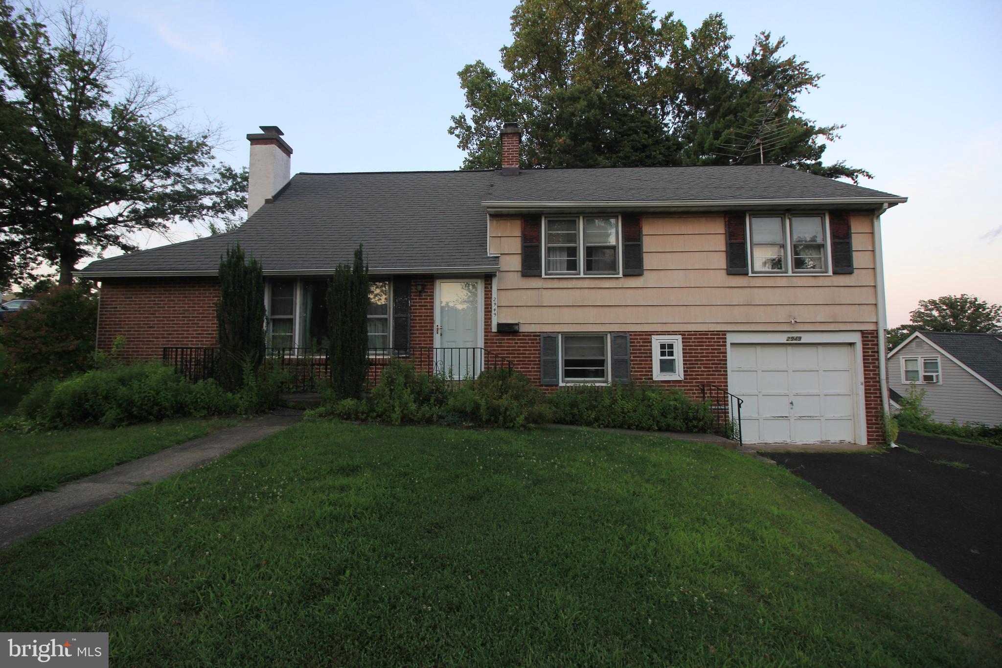 Welcome to 2949 Grisdale Road, a classic split-level home situated on a desirable corner lot in Abington School District. This 4-bedroom, 2.5-bath property offers over 1,500 square feet of living space and is ready for a buyer to bring their vision to life. The main level features a bright and inviting living room with a large bay window and a cozy wood-burning fireplace, a formal dining room perfect for gatherings, and a kitchen with wood cabinetry offering plenty of workspace and wood cabinetry. A full laundry room with washer, dryer, and extra storage completes this level. Upstairs, the second floor hosts three bedrooms, including a primary suite with a full bath and stand-up shower, along with a hall bathroom with a tub. The third floor includes a fourth bedroom, ideal for a 4th bedroom, home office, or guest space, with access to attic storage. The finished lower level provides an additional living space with hookup to a wood-burning stove. This floor has a powder room, and offers access to the one-car garage, and rear screened-in porch overlooking the backyard. Additional features include central air, gas heat, a storage shed, and a private driveway. This home is being sold in as-is condition, offering an excellent opportunity for an investor or handy homeowner to add their personal touch. Located just minutes from Willow Grove Mall, shopping, dining, parks, train stations, and the PA Turnpike, this property combines convenience with potential. Schedule your showing today and imagine the possibilities.
CALL or TEXT the Listing Agent to Schedule a Private Showing.