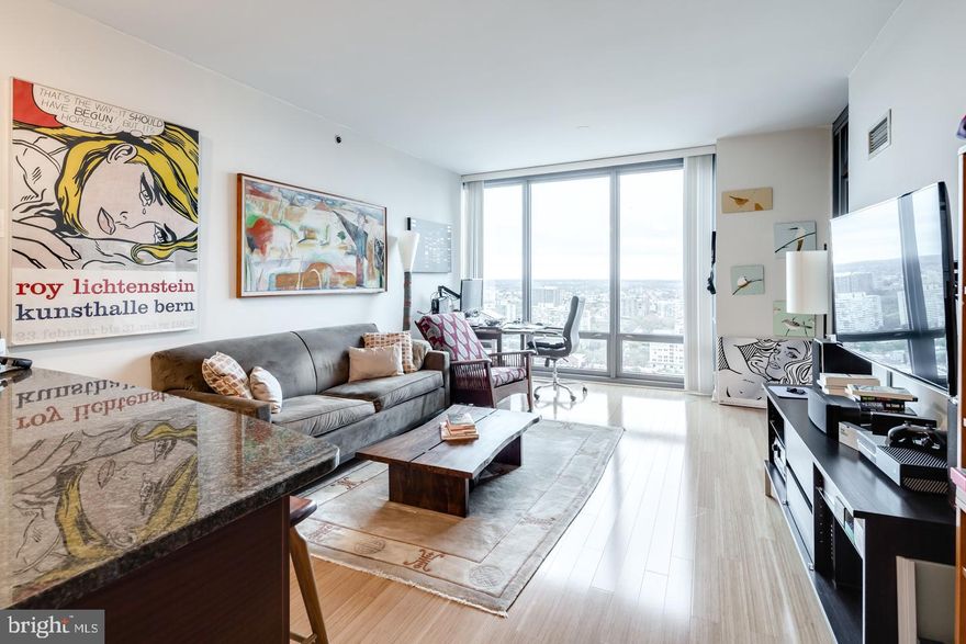 A spacious and luxurious condominium with great North facing views.  This 1-bedroom, 1-bath residence features modern and luxurious finishes including granite countertops, wood floors, stainless steel appliances, 9-foot ceilings with floor to ceiling windows. The price includes a reserved parking space in the attached covered garage, and a storage locker. The building features a 24HR Concierge, fitness center, a heated 60FT lap pool, renovated sundeck/community room and much, much more! The building is situated conveniently next door to Trader Joes and Wine & Spirits - and is just walking distance from Philadelphia's top-rated restaurants. Spend the day shopping in Rittenhouse, or enjoying the sights at Boathouse Row, you can't beat the location and attractions located right near the Murano! Don't miss out on this unit