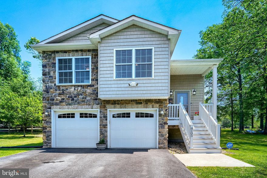 Welcome home to this beautifully maintained 4-bedroom, 3 full bath contemporary split foyer nestled on a spacious ½-acre lot in Severn with no HOA! Offering the perfect blend of country feel and everyday convenience, this turnkey, move-in ready home is just minutes from major commuter routes, shopping, restaurants, entertainment, and nearby elementary schools.

Pride of ownership abounds throughout this thoughtfully updated home featuring a one-year-old high-efficiency heat pump and a 100 gallon high-efficiency commercial-grade water heater. The main living level boasts an open-concept layout with a bright living room, kitchen, and dining area perfect for everyday living and entertaining. The primary suite includes a private full bath, while two additional bedrooms and another full bath complete the upper level. Step outside from the dining area to the rear deck overlooking the expansive backyard.

The lower level offers a spacious family room with sliders leading to the patio and backyard, a fourth bedroom, an additional full bath, laundry area, and interior access to the attached 2-car garage. With ample indoor and outdoor living space, modern efficiencies, and an ideal location, this home truly has it all!