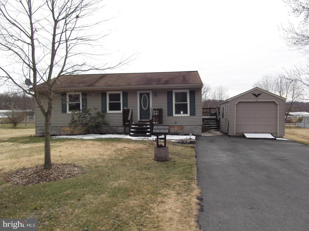 Well maintained raised ranch on 1/2 acre country lot-This home features 3 bedrooms, 1 1/4 bath, new kitchen countertops and tile backsplash-Finished lower level-One car detached garage and a large deck that overlooks pasture area-One year home warranty included-Call to set up a private showing today!