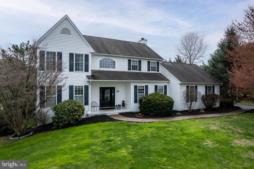 Nestled in a serene cul-de-sac lane,  this beautiful two-story home sits on a spacious, private country lot, surrounded by mature trees and lush landscaping. A fenced backyard offers both privacy and a perfect space for outdoor enjoyment. The home's timeless charm is complemented by thoughtful upgrades and meticulous care throughout.

Main Level: As you enter, you are greeted by a grand two-story foyer with a striking turned staircase, setting the tone for the home's elegance. The formal living room features a large triple window, allowing for abundant natural light, and gleaming hardwood floors that continue throughout the main level. The formal dining room, with its tasteful chair rail and hardwood floors, provides an ideal setting for gatherings and special occasions.

At the heart of the home, the stunning kitchen boasts handsome maple cabinetry, gleaming granite countertops, a stylish tile backsplash, and  stainless steel appliances. The spacious eat-in area offers a cozy spot for casual dining, while the kitchen seamlessly opens to the inviting family room. Relax by the wood-burning fireplace or step through the triple slider to the expansive composite rear deck—perfect for entertaining or enjoying the peaceful surroundings.

For added convenience, the main level includes a laundry room, a mudroom at the garage entrance, and a powder room for guests.

Second Floor: Upstairs, the luxurious owner's suite features a tray ceiling and a spa-like 4-piece bath complete with a soaking tub, separate shower—creating a perfect retreat. Three additional generously sized bedrooms provide ample space for family or guests, all sharing a full hall bath.

Lower Level: The fully finished basement offers endless possibilities with a large recreation room ideal for games, movies, or relaxing, along with a dedicated in-home office area—perfect for remote work or hobbies.

Additional Features: This home also includes a two-car attached garage.

Many rooms have been freshly painted, showcasing its move-in-ready condition. Recent upgrades include a recently installed HVAC system and other thoughtful improvements, ensuring comfort and efficiency for years to come.

Location & Lot: The tranquil cul-de-sac location, combined with the expansive, beautifully landscaped lot, offers a private, country-like atmosphere while still being close to conveniences. Enjoy the peace and serenity of your surroundings, with mature trees and well-established plantings enhancing the charm and beauty of the property.

Sliding glass door was recently replaced along with several windows also, hot water heater well pump low pressure tank. HVAC about 1 year old.