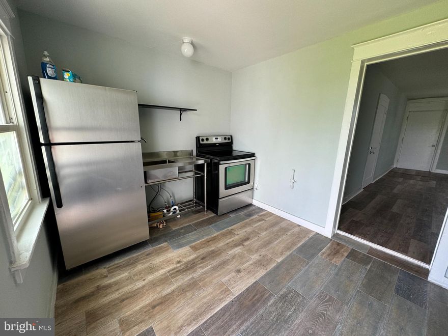 REMODELED TOWNHOME between Gettysburg and Littlestown! 3 Bedroom with full bathroom and laundry (washer and dryer combo) in kitchen.  Kitchen with refrigerator and Oven. Space for separate dining room in large living room. New flooring, windows and appliances! 3rd floor bedroom! Shared backyard.  Exterior finishing touches being completed as weather permits!  $40 application fee.  Pet on case by case bases with $300 nonrefundable pet deposit and $50/mo rent.   Neat and clean - move in ready! Available for June 1st rent!