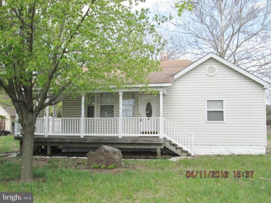 THIS EXPANDED RAMBLER SITS ON A DOUBLE LOT .49 ACRES. THE PROPERTY NEEDS SOME TLC BUT HAS GREAT POTENTIAL. LARGE FRONT PORCH-FAMILY RM-DINING RM-VAULTED CEILINGS-MASTER BR AND MASTER BATH-OUT BUILDING & GARAGE. SELLER IS EXEMPT FROM PAYING RECORDATION & TRANSFER TAXES SO BUYER PAYS ALL.