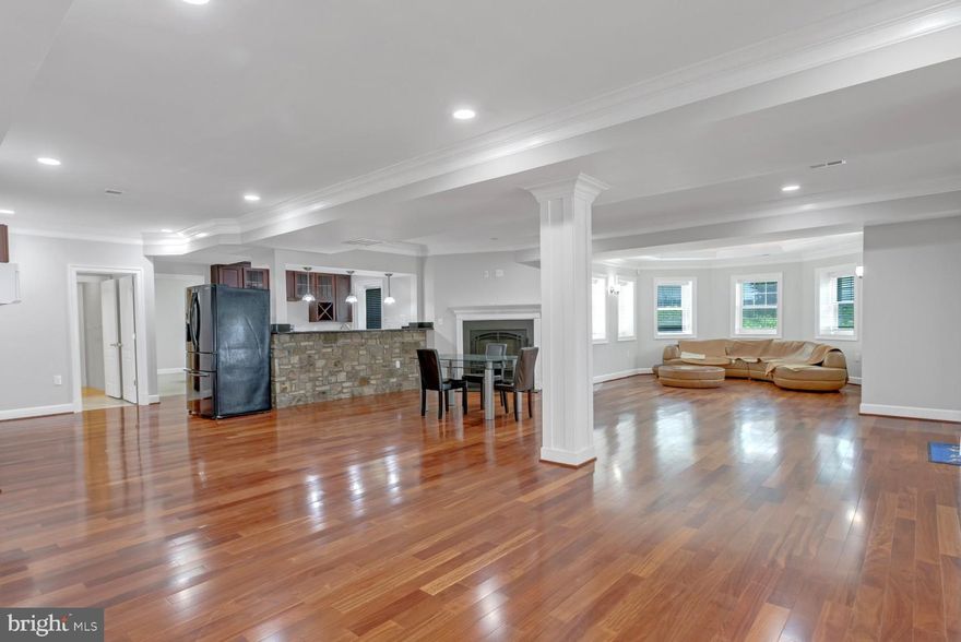 Spacious 3-Bedroom Apartment in a Luxury Estate Home located in McLean, this beautifully finished 3-bedroom, 2-bath apartment offers upscale living with exceptional privacy. Situated on the lower level of a custom estate home, the unit features its own private entrance—ideal for those seeking comfort and convenience in a serene setting. Inside, you’ll find a full-size kitchen with ample cabinet and counter space, a large open-concept living and dining area, and a cozy fireplace perfect for relaxing or entertaining. Additional highlights include hardwood floors throughout, an in-unit washer and dryer, and a dedicated home theater room for the ultimate movie nights. All three bedrooms are generously sized and offer excellent closet space. Option to rent partially furnished is available. Conveniently located with easy access to major commuter routes, shopping, dining, and top-rated Fairfax County schools, this unique rental provides a rare opportunity to enjoy luxury living in one of Northern Virginia’s most sought-after communities. Schedule your private showing today!