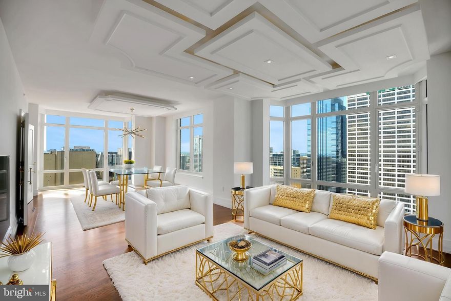 Wow,  Refreshed Price and  entire unit all refreshed to a clean slate...,  Welcome to 10 Rittenhouse Square. A Robert A.M. Stern design for Philadelphia's Ultimate Address.   This exceptional property has just been completely refreshed to a pristine blank canvas. Enter this Penthouse level residence and be received in the Grand Foyer taking you to the impressive Gallery Hall nicely set for large artworks. Leading to the expansive great room and dining area all with rich Brazilian hardwood floors and a wall of windows featuring stellar views of the city's iconic skyline. This expansive 2560 sq ft 3 bedroom 2 and half bath home has the expected level of luxury details, finishes and services that 10 Rittenhouse has to offer. The very large dine-in gourmet kitchen has entry from the gallery hall and beautiful French doors which open to the dining and great room area. Start your day in the sun filled breakfast area or in the dining area with three-sided floor-to-ceiling windows. A center island has an oversized breakfast bar area and generous storage. Pristine with all top-grade finishes, including, Kashmire granite counter-tops, Olivieri stainless steel sink, Poggenpohl cabinetry, Sub-Zero refrigerator, Miele dishwasher, Miele wall oven, Miele gas cook-top and a Viking hood. Primary quarters include a main bedroom suite with luxury Carrera marble radiant heated floor bathroom with frame-less shower, sumptuous jet tub and two separate generous custom fitted walk-in closets. 10 Rittenhouse is a full-service concierge doorman building with Signature amenities to include a chauffeur driven town car at your service, state-of the-art fitness/strength training center, saline pool, yoga studio, board room, party room w catering kitchen, wine storage, bicycle storage, courtyard and garden terrace, guest suite for overnight guests and an array of services for residents. This residence includes one storage locker and garage parking license for one car, tax abatement until 2027. Designed by a Philadelphia award winning design firm and completed to be a glamorous retreat. Dramatic  details such as decorative moldings and the dropped cove-lit ceiling, decorative lighting fixtures, lavish bespoke design elements including gold leafing on the crown molding, hand-crafted wall covering in the master & powder room, the decorative hardware, along with state-of-the-art features throughout complete the space to make it both serene and convenient. Attention to detail, craftsmanship, and comfort.