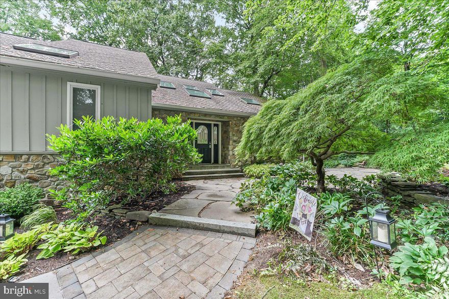 Contemporary Hillside Retreat on 2.1 Acres.  Discover the beauty and tranquility of 8 Briarwood Court, a stunning contemporary home nestled in the woods,  This updated hillside home is designed for those who appreciate both modern amenities and the serenity of nature.  The main floor has a spacious  en suite with plenty of natural light.  The open -concept living area is perfect for entertaining, with vaulted ceilings,  wrap around  windows and doors  that flood the space with natural light, and two sets of patio doors leading to a  composite deck where you can relax and enjoy the seasons.  The updated kitchen is equipped with modern conveniences, electric stove, and ample cabinetry.   Down the spiral staircase to lower level you will find two bedrooms, wine cellar,  laundry room, access to 2 car garage and outside to lower deck.  With parking up to five vehicles, this home offers both style and practicality.  Enjoy country living with modern comforts in this lovely setting --don't miss the chance to make it your own.