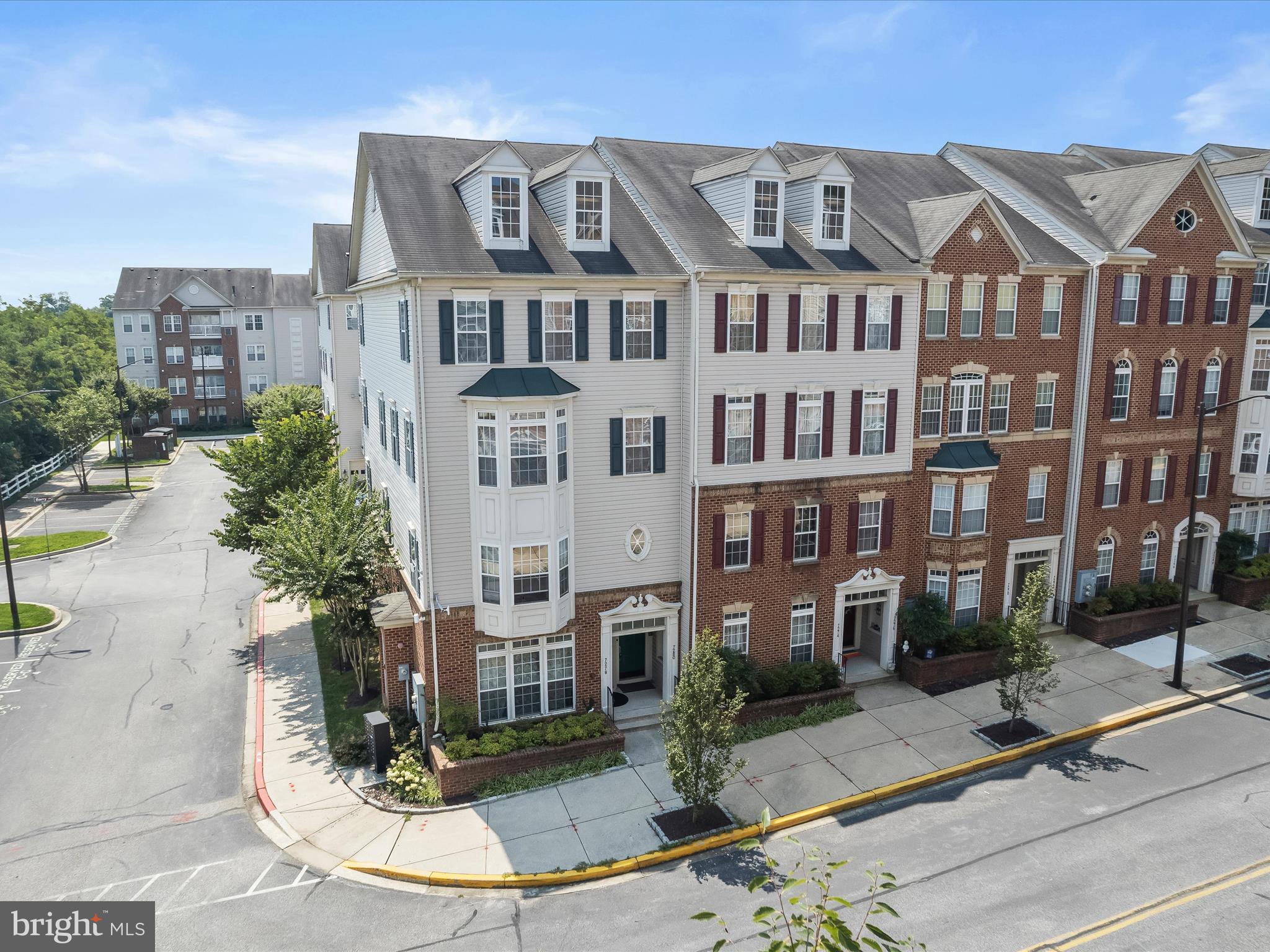 Welcome to this spacious townhome in sought-after Elkridge, offering a sun-filled open floor plan designed for modern living. Beautiful bamboo flooring, accent molding, and a soothing neutral color palette flow throughout the main level, creating a warm and inviting atmosphere. The chef’s kitchen is a true highlight, featuring an oversized island breakfast bar, granite countertops, 42" wood cabinetry, stainless steel appliances including dual wall ovens, and a breakfast nook with access to the deck, and seamlessly flows into the family room that highlights a cozy gas fireplace. Upstairs, the impressive primary suite boasts a lighted tray ceiling, two walk-in closets, and a luxurious en suite bath complete with a jetted tub, separate shower, and dual vanity. The upper level also includes two additional bedrooms, a shared hall bath with a dual vanity, and a convenient laundry room. Additional features include entry-level garage access with a private parking pad. Ideally located near major commuter routes, shopping, dining, and entertainment, this home truly has it all!