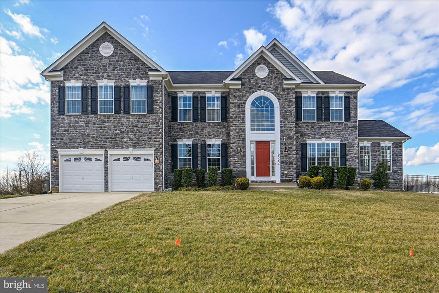 HONEY, STOP THE CAR!!  This beautiful LUXURY 7100 sq ft. home is the fully loaded KINGSPORT, the #1 best selling model offered by Caruso Homes in sought after Washington Overlook in Ft. Washington, MD!  This 6-year young home is a replica of the model with all the upgrades.  Enter into the spacious, light filled two story foyer through a 10 ft door with views of the grand staircase, conservatory and what is to come in the impressive great room.   Light abounds in this beautiful home with tons of windows and soaring ceilings.  A formal dining room to the left and living to the right, the conservatory lies just beyond which includes beamed vaulted ceilings, porcelain tile floors, a bank of windows and deck beyond the sliding glass doors.  
Work from home?  Walk to the rear, stop and pause at the double glass doors which open to the den/office appointed with a wall of floor to ceiling built in shelving with an ebony finish.  Just beyond, take in the space and comfort of the main living area of the home with grand palladium double height windows, coffered ceiling, stone gas fireplace, a view of the bridge that connects the bedrooms on the second level.  Love to entertain?  A butlers pantry services the dining room as well the great room and there is plenty of seating at the island where your family and guests like to gather.  The 19 foot Morning Room allows for a dining table for the largest of families and guests while still remaining open to the great room, kitchen and deck.    A mudroom/laundry room combination is conveniently located off the kitchen with access to the garage.  Step outside onto the roomy composite deck which ensures low maintenance so you can spend time relaxing and enjoying your home on .8 acres with an underground sprinkler system.  No worries, the riding mower conveys if you choose to do your own yardwork.  A beautiful black iron fence and gate defines the property lines.
You can enter the 2nd level from the rear staircase off the kitchen or from the foyer. To the right are two bedrooms with walk in closets and a hall bath.  To the left is a secondary bedroom with an ensuite bath and the expansive owner’s suite with tray ceiling, three walk in closets and sitting area.  The Caribbean Super Bath does not disappoint with two sink areas, two water closets, floating tub, and walk-thru two head shower.  
The finished walk-up basement of over 2000 sq ft. completes this entertainer’s home with a huge lounge, theater room and gaming space with full bar and another full bath.  There are two very large storage spaces and a spacious unfinished bonus room which would be perfect for an exercise room, second office, playroom or whatever your mind can envision.
The Kingsport is still being built with these options by Caruso for considerably more in 2023.  Buy smart and check out this home in excellent condition and the builders warranty is transferable to the new owner.
Conveyances by the current owner if desired are the riding mower, pool table and shuffle board table and all projection/sound equipment in theater room.