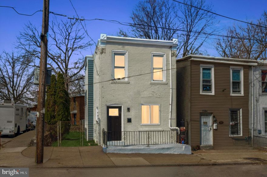 Introducing a beautifully renovated home in the Ogontz section of Philadelphia, poised gracefully on a sizable corner lot. This exceptional property seamlessly blends modern sophistication with functional living spaces. Step inside to be welcomed by a spacious living room that offers the perfect setting for relaxation or for hosting guests. The open-concept kitchen is a culinary enthusiast's dream, complete with appliances and effortlessly flowing into the dining area. This inviting space inspires enjoyable cooking and dining experiences. Adding to the main level's convenience and practicality is a half bathroom and a laundry room, thoughtfully designed to fit your everyday needs. Venture upstairs to discover three generously proportioned bedrooms radiating with natural light and offering ample storage space. A tastefully renovated full bathroom completes the second floor, providing a tranquil retreat within your home. The home's exterior is equally impressive with a vast fenced-in backyard. This expansive outdoor space presents unlimited possibilities for outdoor entertainment, children's play, or simply basking in the sun. Experience the joy of owning this exquisitely renovated home in Philadelphia, PA. With its balance of indoor elegance and outdoor enjoyment, this property is truly a rare find. Don't miss your chance to call this gem your own!