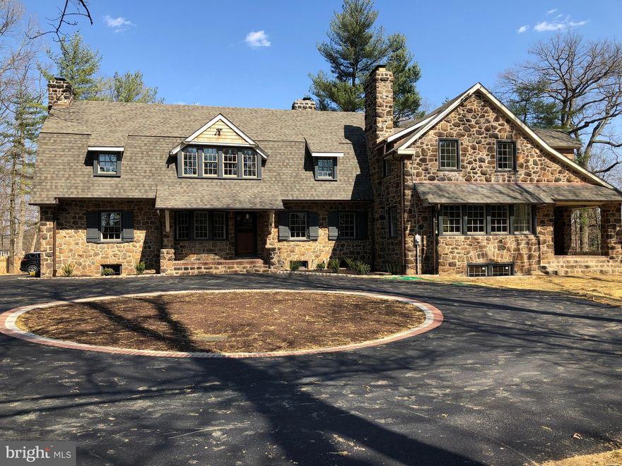 Welcome to 107 Darby Rd: This is a very beautiful, charming, and unique Okie inspired, all stone home. It has been totally  & carefully renovated  (from inside studs to outside walls). The entire home has been modernized to meet modern living standards while retaining the charm and details of old. RA Hoffman Architects designed the interior plans. Many of the features include: bright and open spaces, fabulous state of the art all new eat-in kitchen with center island, high end (monogram) SS appliances, hard wood floor and lots of recessed lighting. Family room has a large stone fireplace, ceiling beams, window seat and access to a covered stone/brick porch, side patio and partially finished lower level. Living room w/stone fireplace and ceiling beams,  dining room w/stone fireplace.  2nd floor has a master suite complete with sitting room, all new full bath w/stall shower and tub and walk/in closet with organizers. There are 3 additional bedrooms, 2 w/en suite baths, hall bath,  sitting area on landing  and laundry.  3rd floor attic is partially finished with additional storage.  Basement is huge and  partially finished with fireplace, long window seat and ceiling beams.  The many improvements include: new kitchen; new  2-car attached garage with flexible room above it that can be finished;  new plumbing and 3 heating/cooling systems. All new wiring and lighting; 4 1/2 new baths;  new roof/gutters & downspouts; windows, doors, flooring, subflooring, flagstone patio and walkway. New circular driveway fresh painting in/out, all exterior and interior stone repointed. Hardwood on both floors.   Yard Has been seeded.This home is centrally located with ease access to train, shopping, major routes and Main Line amenities.Don't miss it! Easy to show!