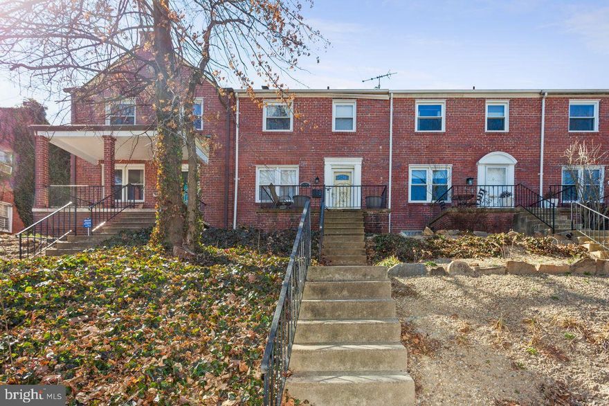 Gorgeous 3 bedroom 2 bath renovated rowhome in Historic Ednor Gardens is immediately available for rent. Kitchen features quartz countertops, maple cabinets with stainless appliances including dishwasher, new built-in microwave, new refrigerator, and garbage disposer. The sun-filled home boasts a large open-concept with a combined living and dining area with large windows and recessed lighting. Gleaming hardwood floors are throughout main and upstairs levels. Upstairs has three bedrooms and one bathroom with tub and shower combo, with dual vanity, quartz countertops, and dual hallway and primary suite access. Primary bedroom has THREE closets! The additional two top floor bedrooms have large closets, hardwood floors, and ceiling fans for comfort. A spacious, walk-out finished basement with ceramic tile floors has a large den with closet and a window, a private entrance, and a three-piece bath with stall shower. In unit laundry in basement, as well as a large storage closet. Rent includes private parking for two cars. Enjoy the large front porch with sunset views to enjoy during the warm months. Pets allowed on a case by case basis. Pet rent and non-refundable pet deposit.