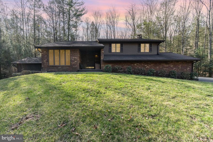 Welcome to 48 Turnpike Road!! This charming split-level home is nestled on 3.2 acres of peaceful, wooded privacy and offers a rare blend of rustic tranquility and versatile living. Surrounded by lush forest views, the property invites you into a serene retreat where nature’s beauty harmonizes with warm, handcrafted details. Inside, the home’s cozy character shines through rich woodwork and thoughtfully curated decor, creating an ambiance that feels both timeless and inviting. The spacious layout includes four bedrooms and two baths, with a standout private in-law suite perfect for hosting guests, accommodating family, or creating a dedicated workspace. Gather around the wood-burning fireplace in the living area, where crisp evenings turn into cherished moments. Modern conveniences blend effortlessly with the home’s classic charm, ensuring comfort without sacrificing character. Step outside to your own nature-filled sanctuary, where a sprawling yard offers endless opportunities ...This property isn’t just a home; it’s an invitation for a lifestyle of calm, space, and connection to the outdoors. Homes with this much character and acreage rarely become available. Schedule your showing today, your peaceful Pennsylvania retreat awaits!!