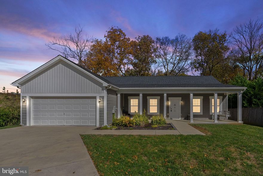 Welcome to 400 Wren Street North, a charming 3-bedroom, 2-bath ranch-style home offering approximately 1,700 square feet of comfortable one-level living on a spacious, landscaped lot in the Crestfield community of Martinsburg. Built in 2018 and beautifully maintained, this home combines modern convenience with timeless appeal in a peaceful neighborhood setting.

The open-concept main living area is bright and inviting, featuring vaulted ceilings, abundant natural light, and a seamless flow that’s perfect for everyday living or entertaining. The kitchen serves as the heart of the home with granite countertops, a large center island with seating, custom cabinetry, and stainless steel appliances—all new within the last two years. A generous dining area and adjacent living room create the ideal gathering space for family and guests alike.

The primary suite provides a relaxing retreat with dual walk-in closets and a private en suite bath featuring a soaking tub, separate shower, and double vanity. Two additional bedrooms share a well-appointed full bath, offering comfort and flexibility for guests, family, or a home office.

Outdoor living is equally inviting with a covered front porch and a rear patio overlooking the fully fenced backyard—perfect for morning coffee, weekend barbecues, or quiet evenings at home. A two-car garage provides added storage and convenience.

Located just minutes from shopping, dining, and everyday essentials, residents enjoy easy access to I-81, Route 9, and the MARC Train, providing a simple commute to Winchester, Hagerstown, and the greater DC metro area.

With its thoughtful layout, recent updates, and desirable location, 400 Wren Street North offers the perfect blend of comfort, style, and convenience in the heart of Martinsburg.