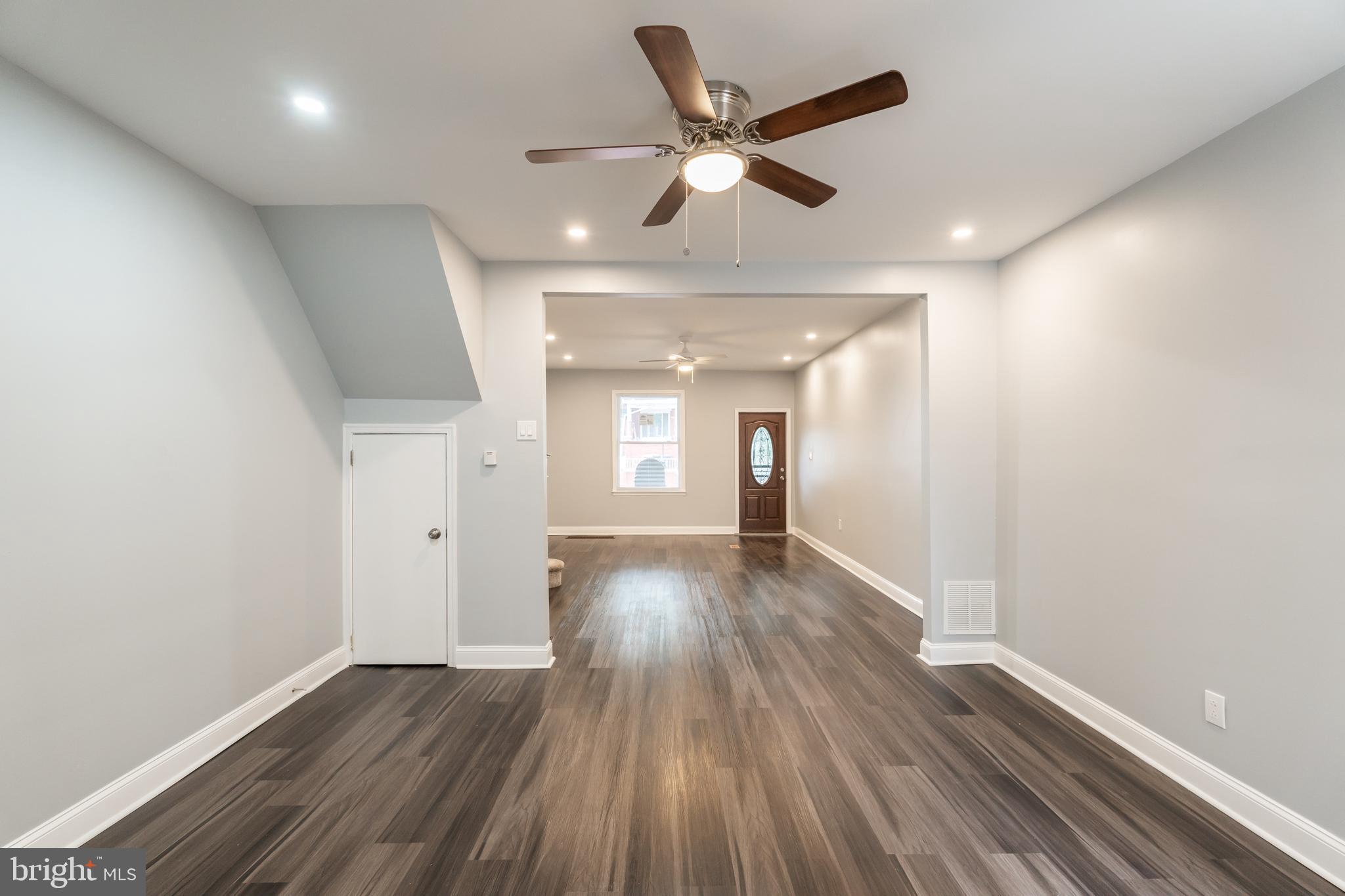 Move into your new HOME in the desirable Carroll Park section of West Philadelphia. ELEGANTLY RENOVATED from top to bottom with an open floor plan, three bedrooms, and two full bathrooms, leaving nothing left to do but unpack and have this place to call your HOME. As you enter the front door, you will be greeted by an open floor plan featuring new, higher-end waterproof laminate wood flooring in the living room, dining area, and kitchen area, with a laundry room with an existing washer and dryer on the back. The remodeled kitchen has an upgraded granite countertop, tiled backsplash, self-closing shaker cabinets, and higher-end stainless steel appliances. As you go up the second level, it offers three spacious bedrooms and a remodeled hallway bathroom. The fully finished basement can be converted into another living space, such as an exercise or family room. There is also a lot of storage space left in the mechanical room, which houses the heating and water heater. Not to mention new plumbing, electrical service box, and windows; no worries for maintenance for the years to come! It's close to public transportation, shopping, dining options, and universities (UPenn, Drexel & St Joseph's University), making it convenient for city living. This property is ideal for first-time homebuyers or investors looking to add to their portfolio. Schedule your showing today!