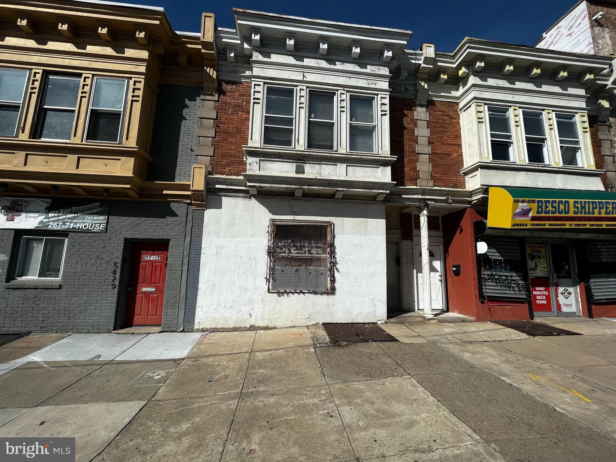Mixed Use 4 units. 1st Floor Storefront Office and 2 bdrm Apt in the rear. 2nd Floor has 2 - 1 bdrm 1 bath apartments. Needs Work.