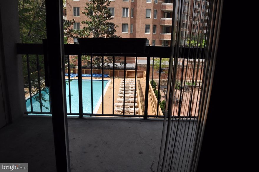 Gorgeous 1 bdrm in Crystal City's Bella Vista. Open kitchen features pass through island, granite, SS appliances, tile backsplash, extensive lighting & wood floors. Washer/Dryer in unit. Living/Dining Room combo with sliding glass door to balcony with view of common area & pool. Tons of closets - WALK-IN closet off bedroom, hall linen closet and huge hall coat closet! WOW bath with subway tile. Garage parking. Gym. Perfect location. Across from Whole Foods, 1 block to Pentagon City Mall, Metro, Costco. Avail immediately.