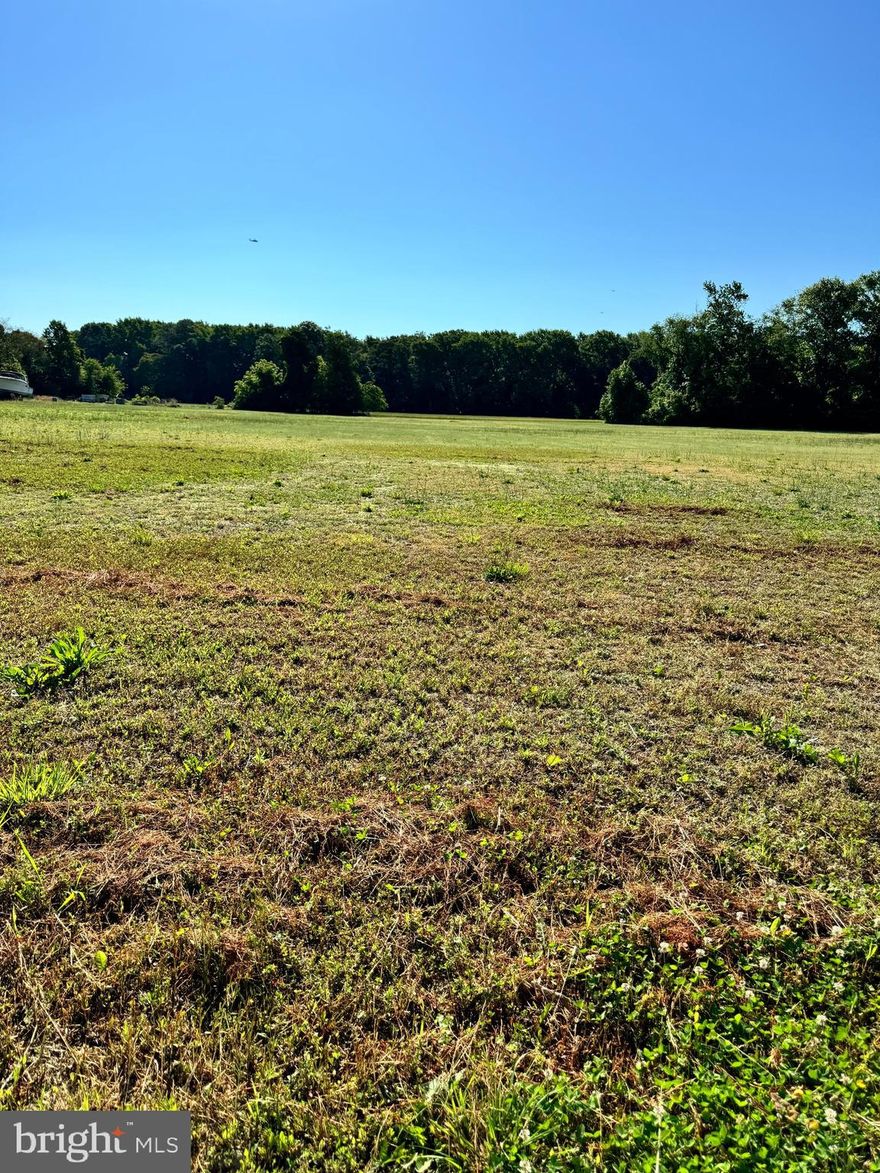 **Prime 6-Acre Lot on Rockawalkin Road – Perfect for Your Dream Home or Investment!** Discover the endless possibilities with this nearly 6-acre lot, ideally situated on Rockawalkin Road. Boasting two perc tests, this mostly cleared property features a charming backdrop of mature trees, creating a serene and private atmosphere. Key Features: - **Size:** Nearly 6 acres - **Location:** Just minutes from Salisbury, offering convenient access to shopping, universities, and beaches - **Potential:** Ideal for building your dream home or possible subdivision for investment - **Utilities:** Two successful perc tests. Enjoy the perfect blend of rural tranquility and urban convenience. Whether you envision a sprawling estate or a lucrative development opportunity, this remarkable lot offers a blank canvas for your aspirations. Don’t miss out on this unique chance to own a versatile property in a prime location. Endless possibilities await the future buyer!