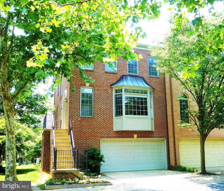 Elegant end unit Townhome in the heart of Fairfax City. Main level features gleaming hardwood floors,            9' ceilings, kitchen/family room combination with 2 sided gas fireplace & walkout to deck. Bedrooms on upper level are exceptionally spacious and lower level features recreation room with gas fireplace, walkout to brick patio and 4th bedroom and full bath, 2 car garage Located in the City of Fairfax close to schools, shopping, entertainment and major access routes.