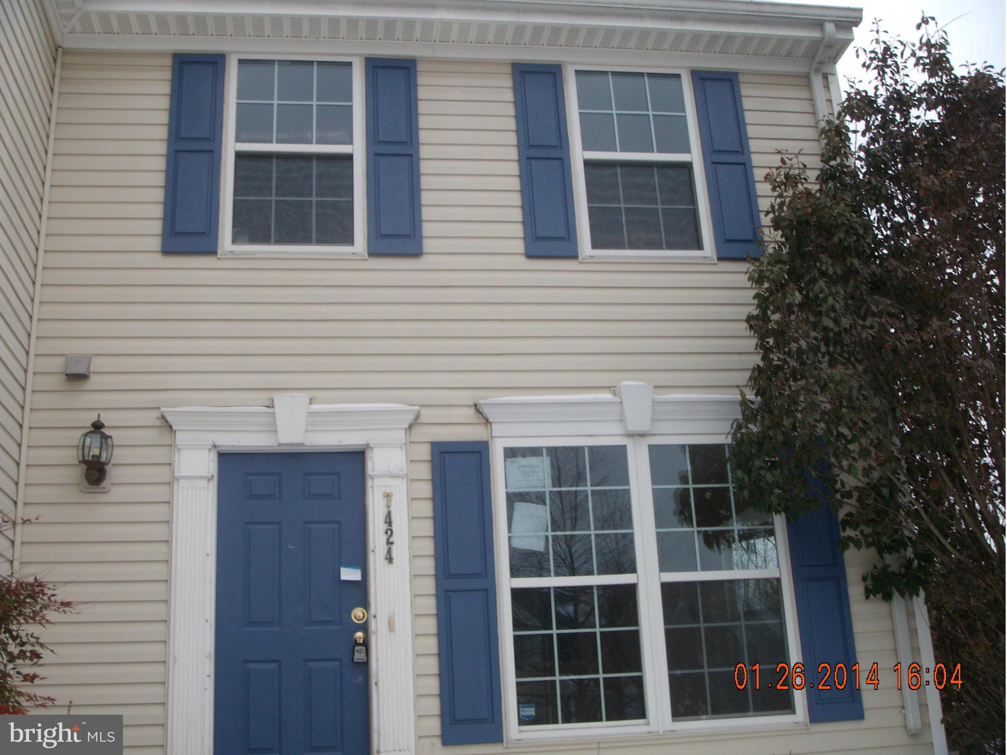 Sunny end unit townhome. Large living room, dining room/kitchen combo, finished basement with fireplace and washer/dryer. Features sizable bedrooms with possible fourth bedroom in basement. This property is eligible under the Freddie Mac First Look Initiative through 03/15/2014.