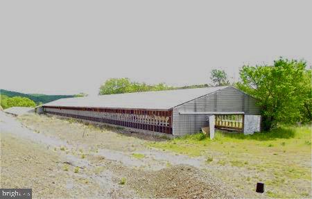 WV RTE #46 - CENTRALLY LOCATED BETWEEN KEYSER AND FORT ASHBY, FORMER POULTRY FARM. (2) MASSIVE 42' X 262' METAL COVERED BUILDINGS CONTAINING 22,880 SQ. FT FOR INDOOR STORAGE. WELL WATER, ELECTRIC, CONCRETE AND GRAVEL FLOORS. LARGE COMMERCIAL LOT WITH LONG ROAD FRONTAGE FOR SIGN DISPLAY. E-Z ACCESS.