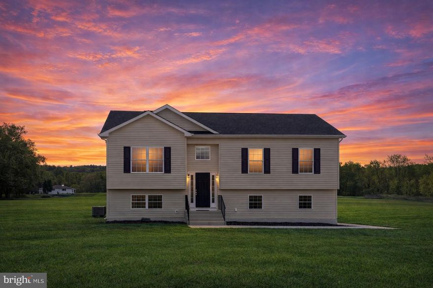 Move in ready!  Don’t miss your chance to own a brand-new home in the charming, historic town of Orange, Virginia. This 4-bedroom, 3-bath split foyer design includes a 12x12 rear deck overlooking a spacious, level lot with beautiful meadow and mountain views.

Inside, the bright, open floor plan features cathedral ceilings and a seamless flow between the living, dining, and kitchen areas that are perfect for everyday living or entertaining. The chef’s kitchen features 42" soft-close cabinets, granite countertops, a large island, and stainless-steel appliances.

The primary suite offers a peaceful retreat with a luxurious bath featuring granite double vanities and a walk-in shower. The lower level expands your living space with a generous family room, a full bath, a laundry/utility room, and access to the oversized 2-car garage.

Designed with modern finishes and durable luxury vinyl plank flooring, this home perfectly balances style and functionality. With seven new homesites available in this lovely subdivision, now is the ideal time to make your move!

Located in walkable downtown Orange, you’ll enjoy nearby shops, restaurants, and conveniences. Orange County is home to James and Dolley Madison’s Montpelier, the annual Fall Steeplechase Races, award-winning wineries, craft breweries, and acclaimed wedding venues. Outdoor enthusiasts will appreciate easy access to Shenandoah National Park for hiking, biking, kayaking, and horseback riding, plus several golf courses just minutes away. Only 40 minutes to Charlottesville, home to the University of Virginia, vibrant arts, and world-class medical facilities.