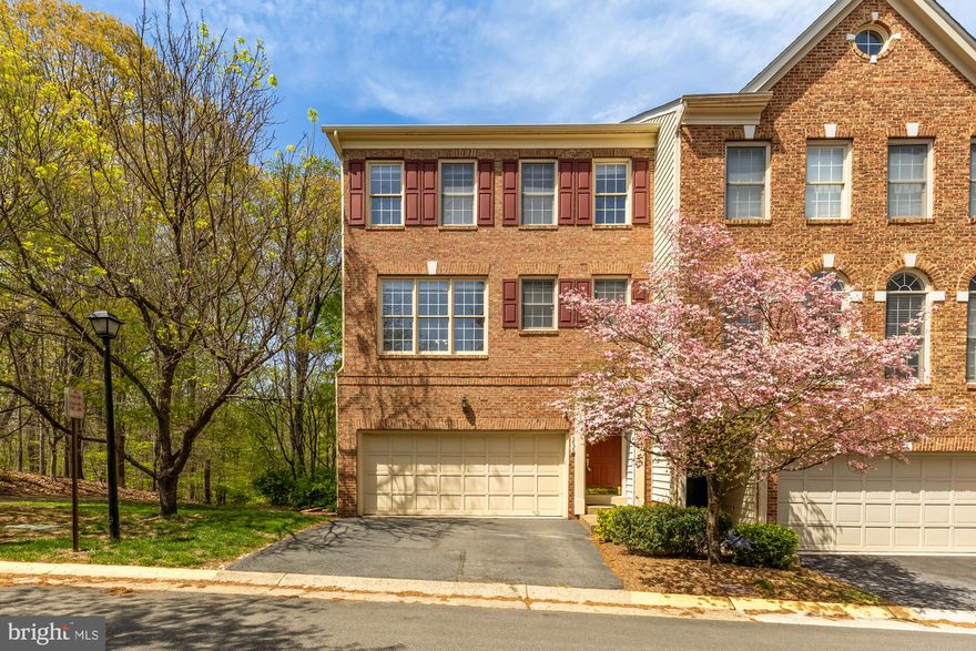 Nestled in the sought-after Windy Hill at Lincolnia community, this end-unit townhome offers a rare blend of tranquility and convenience. Backing to Indian Run Stream Valley Park and adjacent to a scenic walking trail - this home provides a private, peaceful setting all while remaining inside of the beltway... just minutes from shopping, dining, and major commuter routes. Recently replaced roof, HVAC systems (dual zoned), and flooring make this the ideal move-in ready home. This community offers a plethora of amenities including a pool, dog park, walking trails, a playground, a community center, and more!

Step inside to an open and airy main living level, where a stunning wall of Palladian style windows floods the space with natural light and frames the picturesque wooded views. A cozy gas fireplace with built-in shelving adds warmth to the spacious living area with high ceilings. While the elevated deck offers the perfect spot to enjoy your morning coffee in a serene outdoor setting. The dining room and kitchen flow seamlessly, featuring hardwood floors, ample storage, and stainless steel appliances, including a downdraft cooktop, and double wall ovens—ideal for both everyday meals and entertaining.

Upstairs, the primary suite is a true retreat, boasting vaulted ceilings, a large walk-in closet, a spa-like ensuite with a soaking tub, separate shower, and dual vanities. Two additional bedrooms, a full bath, and a conveniently located laundry area complete the upper level. The lower level provides endless flexibility, with an open recreation space that can serve as a home office, gym, or entertainment area, plus a walkout to a private patio and fenced backyard, and a half bath. The lower level also provides ample storage options, including a hidden storage area in the bathroom, and elevated garage shelving, making organizing effortless.

A two-car garage, along with having space for two additional cars, plus ample guest parking make this a rare opportunity in a prime location just minutes from I-395, I-495, and Van Dorn Metro. Commuting to the Pentagon, Old Town Alexandria, Arlington, or DC will be a breeze. Enjoy nearby shopping and dining at Springfield Town Center, Kingstowne, or Shirlington. You'll also be minutes away from the St. James sports complex, and the new Landmark Mall redevelopment "WestEnd Alexandria" which will include Inova hospital's new campus, as well as new shopping, dining, and entertainment options once completed.