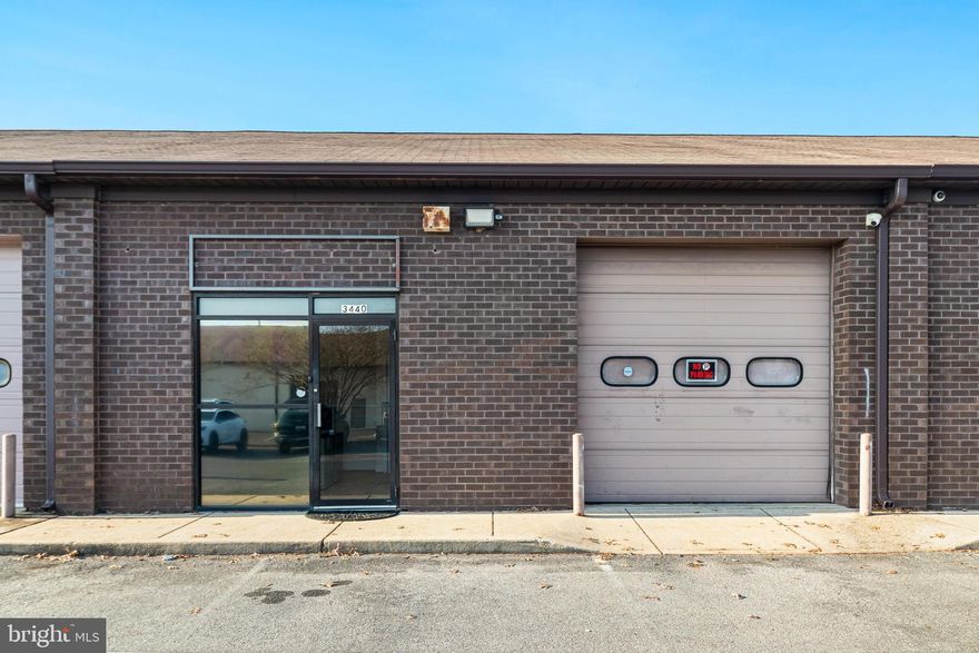 Well-built flex space ideal for professional or contractor use. Former sales office featuring extensive crown molding and upgraded trim throughout. Interior layout includes a large conference room, spacious private office, and reception area. Additional features include a break room with kitchenette, ceramic tile flooring, and a full bath with stand-up shower.
The property also offers a generous warehouse area with drive-in door, providing excellent functionality and versatility. Plenty of parking.  
Condo fee approx. $200/month, covering water, sewer, trash service, and exterior maintenance.