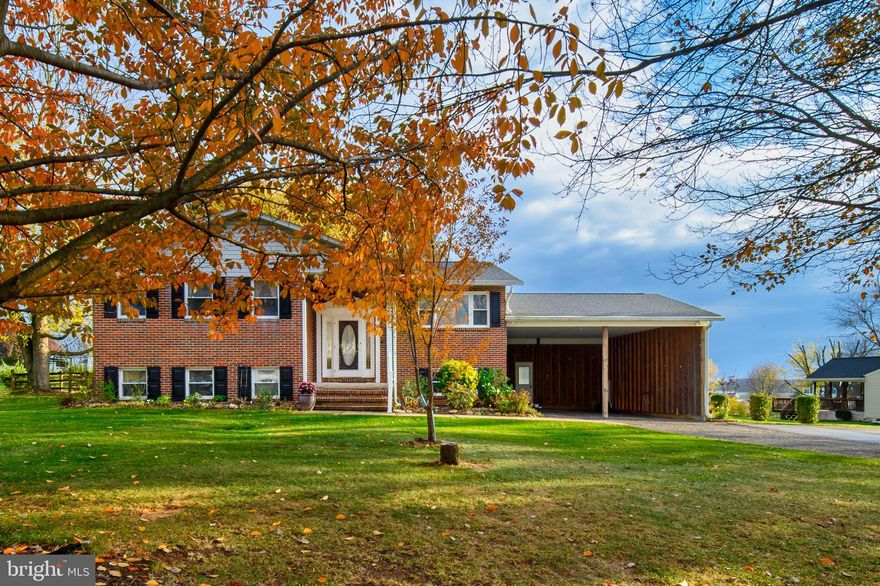 Back on the market-Buyer lost their job.  Spacious is an understatement with this 4-bedroom, 3 full bath split foyer! When you pull up to the home, notice the ample parking and the nicely landscaped yard. The covered front porch leads to an oversized foyer where you will welcome your guests. Walk up the steps and the first thing you notice is the large window at the rear of the home which lights up the main living area. Share a meal with family and friends in the dining area or in the spacious kitchen offering plenty of room for a table. Just off the dining area is a 2-tiered deck (13 x 27 & 14 x 10). Relax in the huge lower-level family room while enjoying the ambiance and warmth of the Quadrafire wood stove. There is enough room for a generous sized seating area as well as a game area and a pool table! The lower level also features a 4th bedroom, a 3rd full bath, an additional bonus room, as well as the laundry/storage area. There are also 10 ceiling fans and 2 storage sheds! Recent upgrades/maintenance include carport (2016), carport walls and septic pumped (2017), water heater (2018), siding replaced, ductwork wrapped and insulation blown into the attic (2019), new 30 year architectural shingle roof, 6-inch gutters with gutter guards (2020), well line replaced, holding tank flushed and drained, LVP installed in the kitchen as well as granite counters and glass back splash (2021), water conditioner replaced, Quadrafire wood stove cleaned/checked, and some new carpet installed (2023).