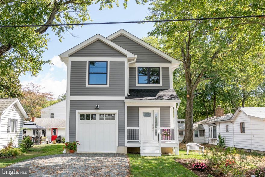 Custom home with attention to every detail. Just step inside to experience all this home has to offer. Leaded glass front door. Beautiful wood floors. Upgraded granite countertop and island. Custom cabinets with soft closure. Gas fireplace with slate surround. Smart refrigerator. 16 seer high efficiency heat pump. Garage with 8ft door. Master bedroom with walk-in closet and custom shelving. Master bathroom has the feel of elegance with marble Carrara vanity top and custom tile. Upstairs laundry. Water view of Rockhold Creek. Herring Bay view has a small waterfront area for the community. Close to all the best restaurants and marinas!!!