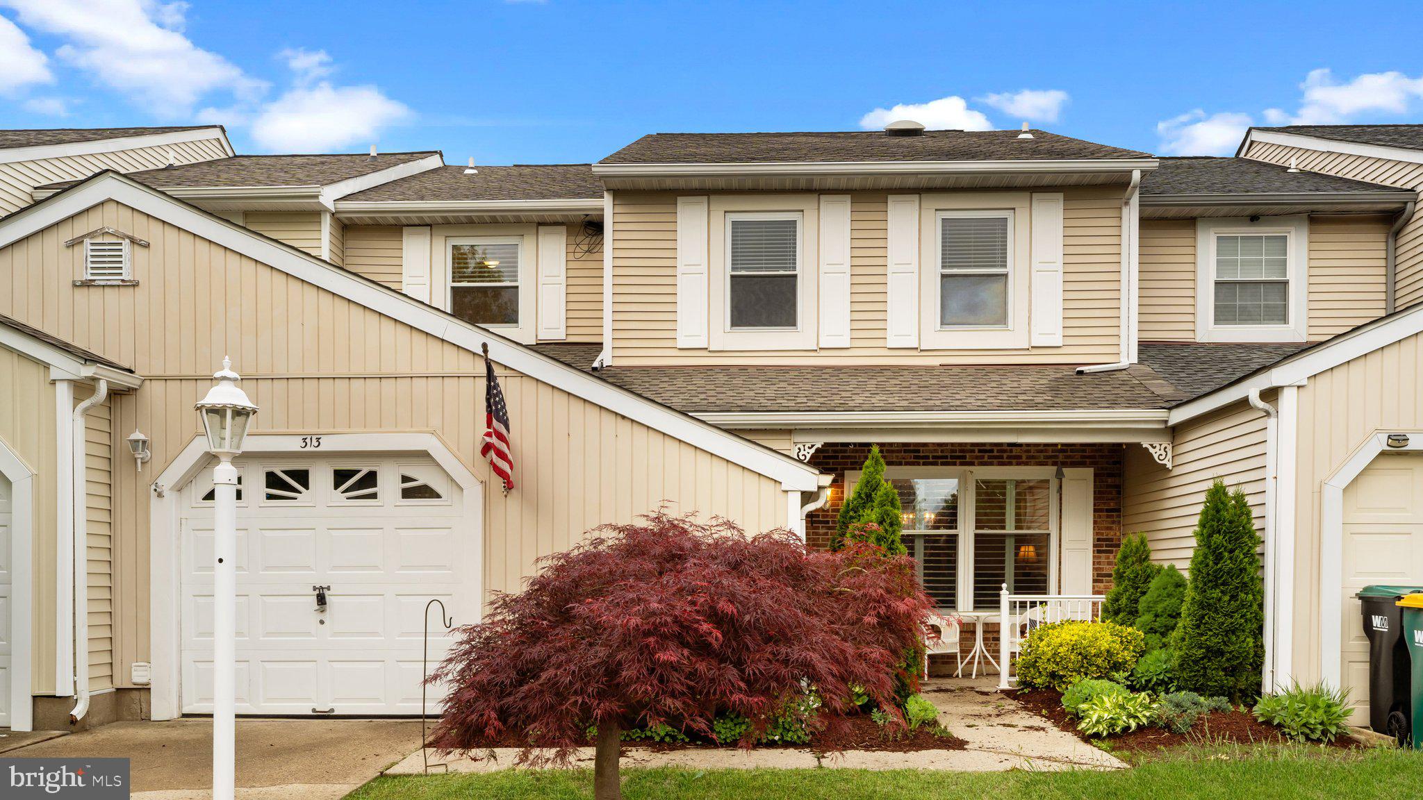 Welcome to 313 Tall Meadow Lane, a 3-bedroom, 2.5-bathroom townhome in the highly desired community of Big Oak Bend in Yardley is now available for rent. You are greeted by a two-story foyer, which leads directly into a big living and dining room perfect for parties. The modern kitchen is well-equipped with a great amount of counter space and new appliances, making it a delight to cook. Off of the kitchen is a cozy family room, featuring a decorative fireplace that adds charm and warmth, along with gleaming hardwood floors. The upstairs master bedroom is distinguished by its vaulted ceilings, generous closet space, and an en suite bathroom with a soaker tub and a stand-alone shower. The other bedrooms have a well-appointed shared bathroom. Exit to a peaceful backyard paradise, ideal for outdoor gatherings or personal relaxation. The home includes an attached garage and driveway offering convenient parking. Located in the Pennsbury School District, this home is minutes away from local favorites like Shady Brook Farm and Core Creek Park. With easy access to major highways and public transportation, commuting is straightforward. Don't miss this opportunity. Make an appointment for a showing today. Dog friendly