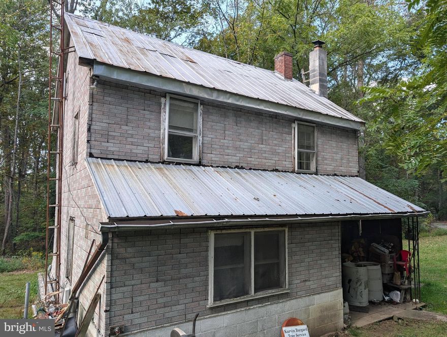 This property is in a prime location in the area of the Pigeon Hills. The house is a fixer-upper, so bring your tools and your creativity and turn this house into the home that you'd love! There are multiple outbuildings as well. The one thing that you cannot change is a location. With just over two acres of wooded land in a rural area of Spring Grove, you will see all kinds of wildlife and enjoy the serene outdoors! Please do not stop on the property without an appointment but be sure instead to call your realtor today and set up an appointment.