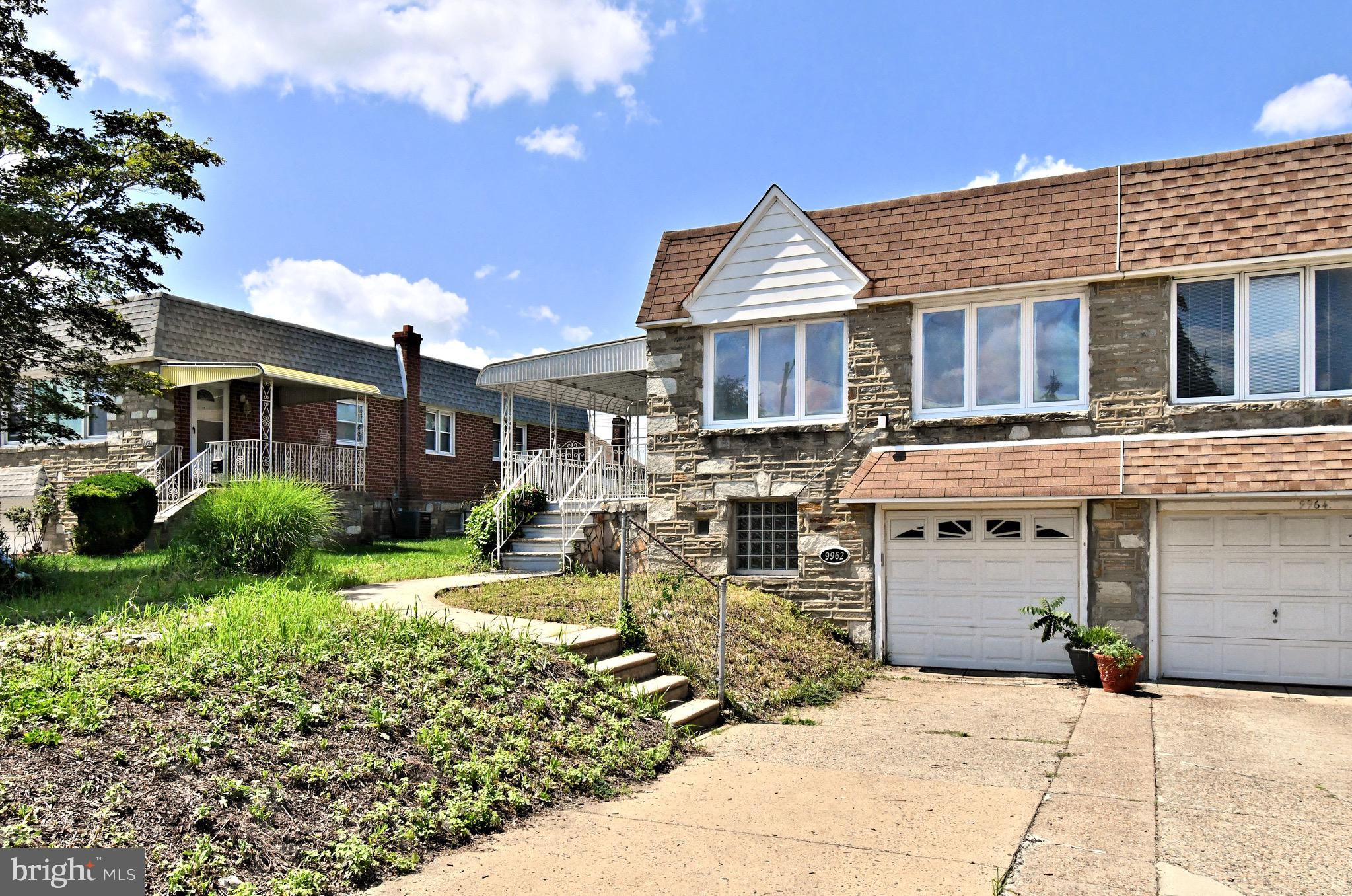 Welcome to this beautifully maintained twin home in the heart of Krewstown. Step onto the charming covered front porch and into a light-filled interior featuring large windows and stunning hardwood floors. The open-concept layout seamlessly connects the living and dining areas to a spacious, updated kitchen—ideal for both everyday living and entertaining. The main level also includes a renovated hall bath, a primary bedroom with its own private bath, and two additional bedrooms. Downstairs, the fully finished walk-out basement offers an abundance of living space, complete with a second kitchen or bar area, a full bath, dedicated laundry room, and ample storage. Outside, enjoy the convenience of an attached garage, a generous driveway, a large front yard, and a fenced-in backyard perfect for pets or play. With central air, a newer roof, replacement windows, and so much more, this home is move-in ready. Don’t wait—schedule your showing today!